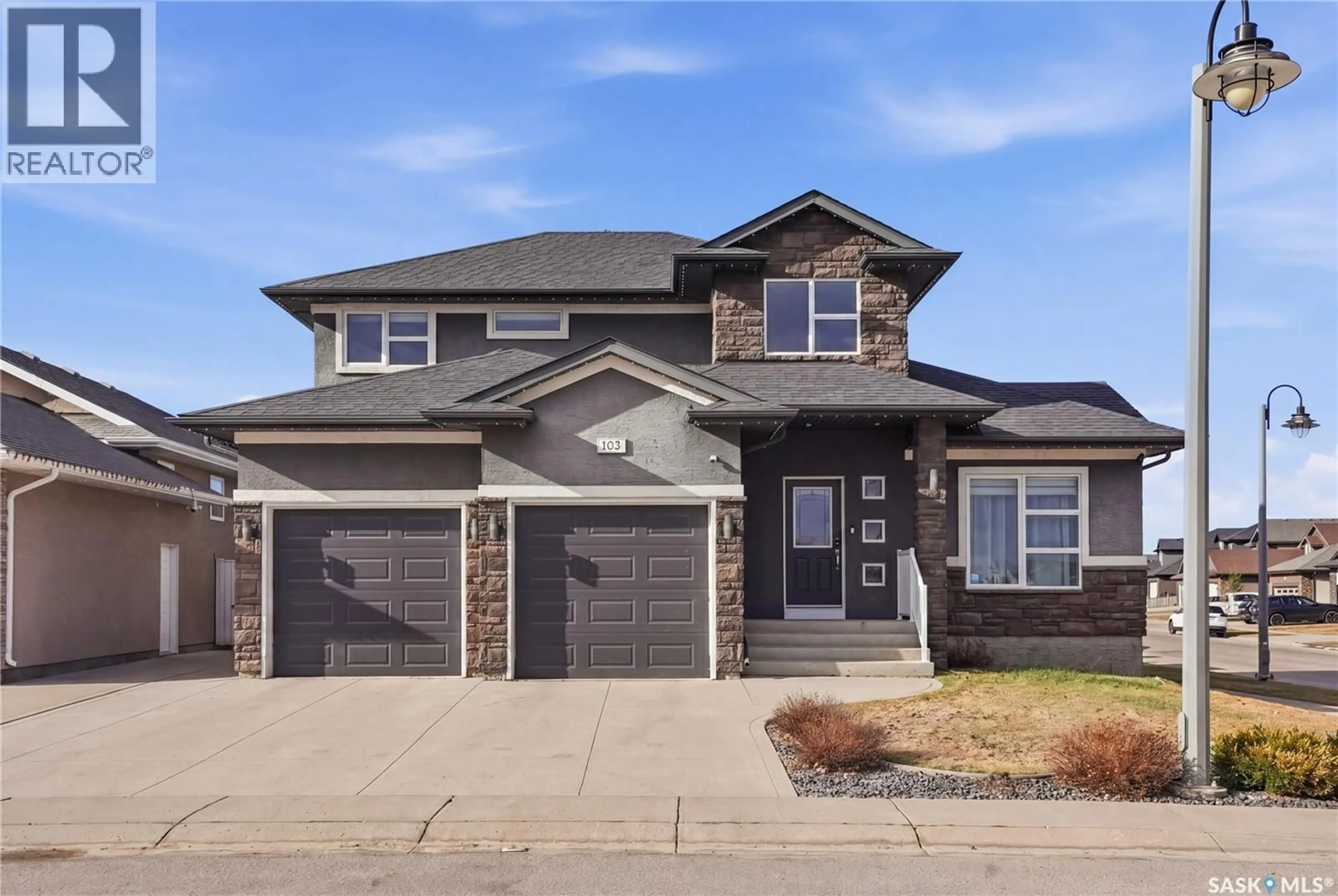 Home with brick exterior material, street for 102 TEAL CRESCENT, Saskatoon Saskatchewan S7T0P9