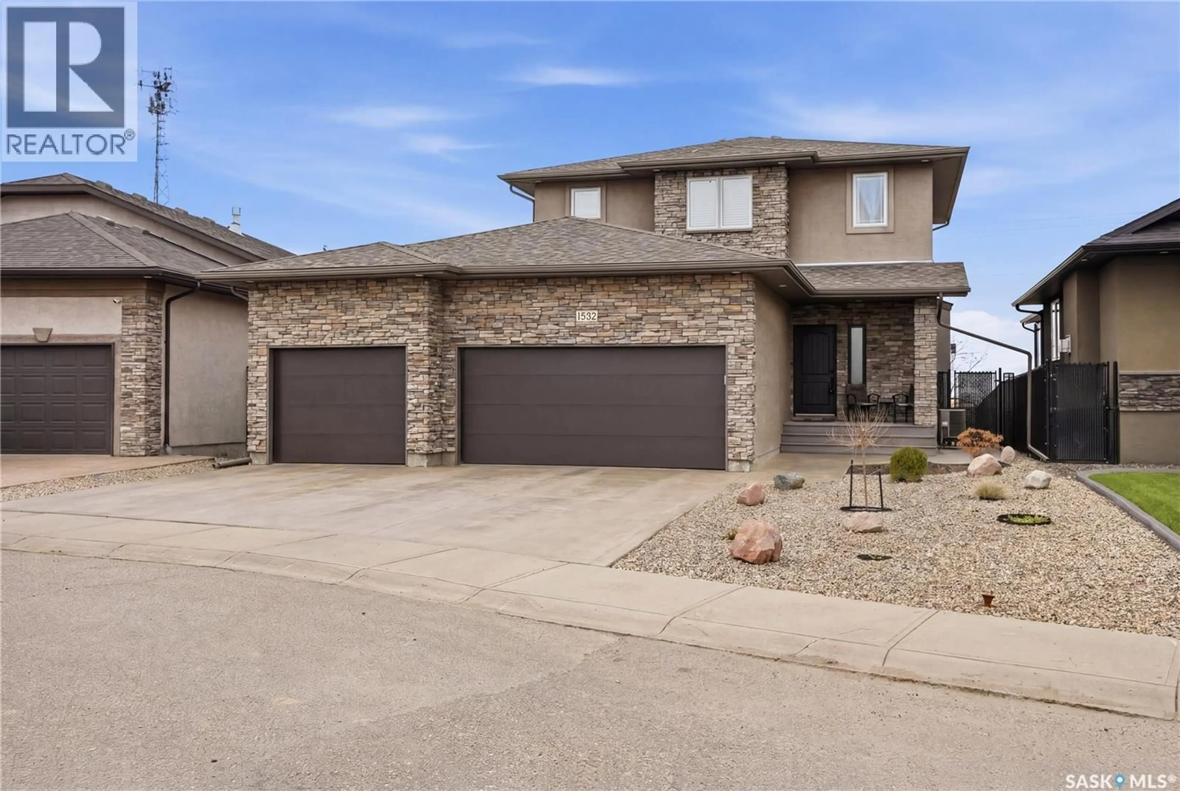 Home with brick exterior material, street for 1532 MAPLE HILL CRESCENT, Regina Saskatchewan S4X0E8