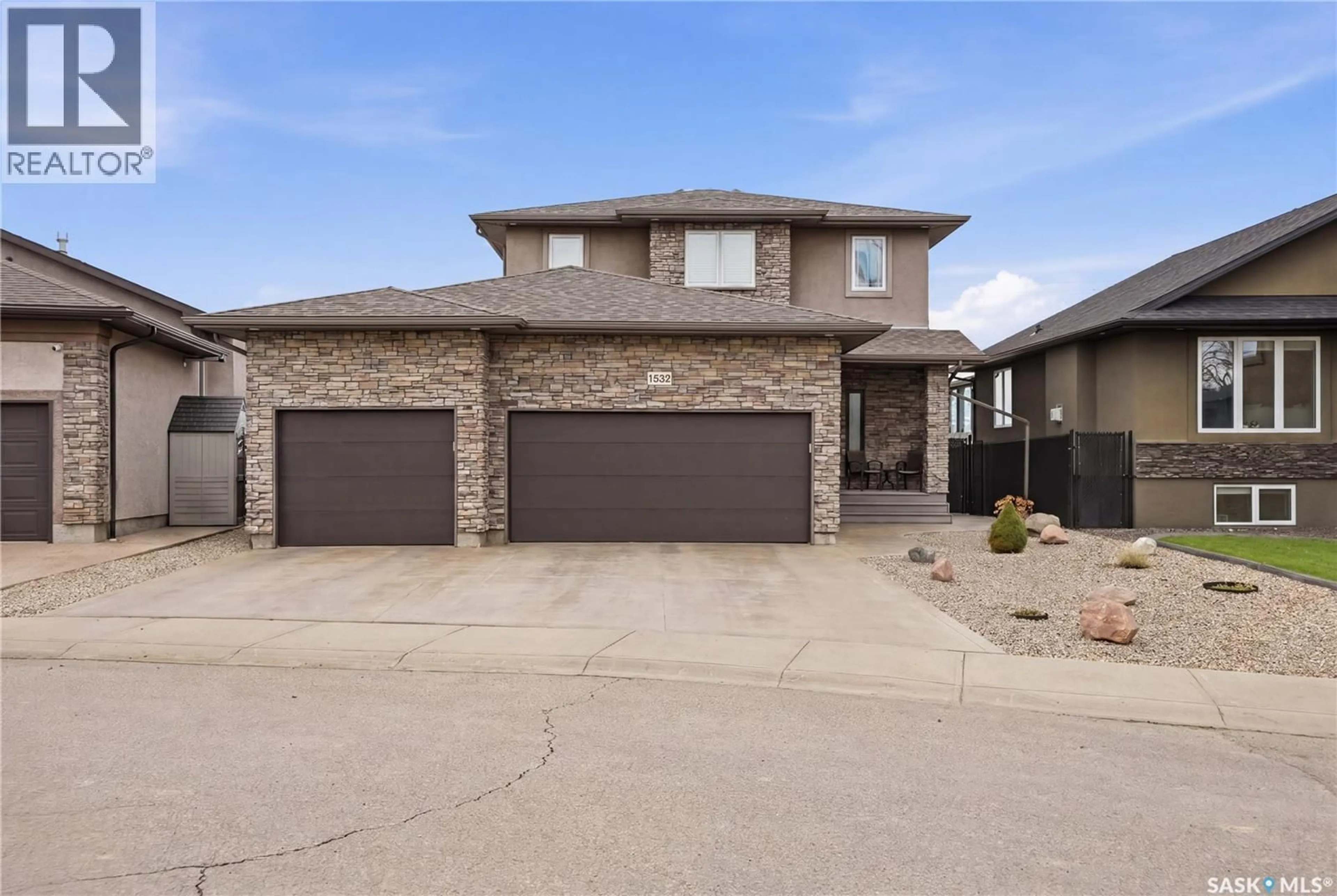 Home with brick exterior material, street for 1532 MAPLE HILL CRESCENT, Regina Saskatchewan S4X0E8