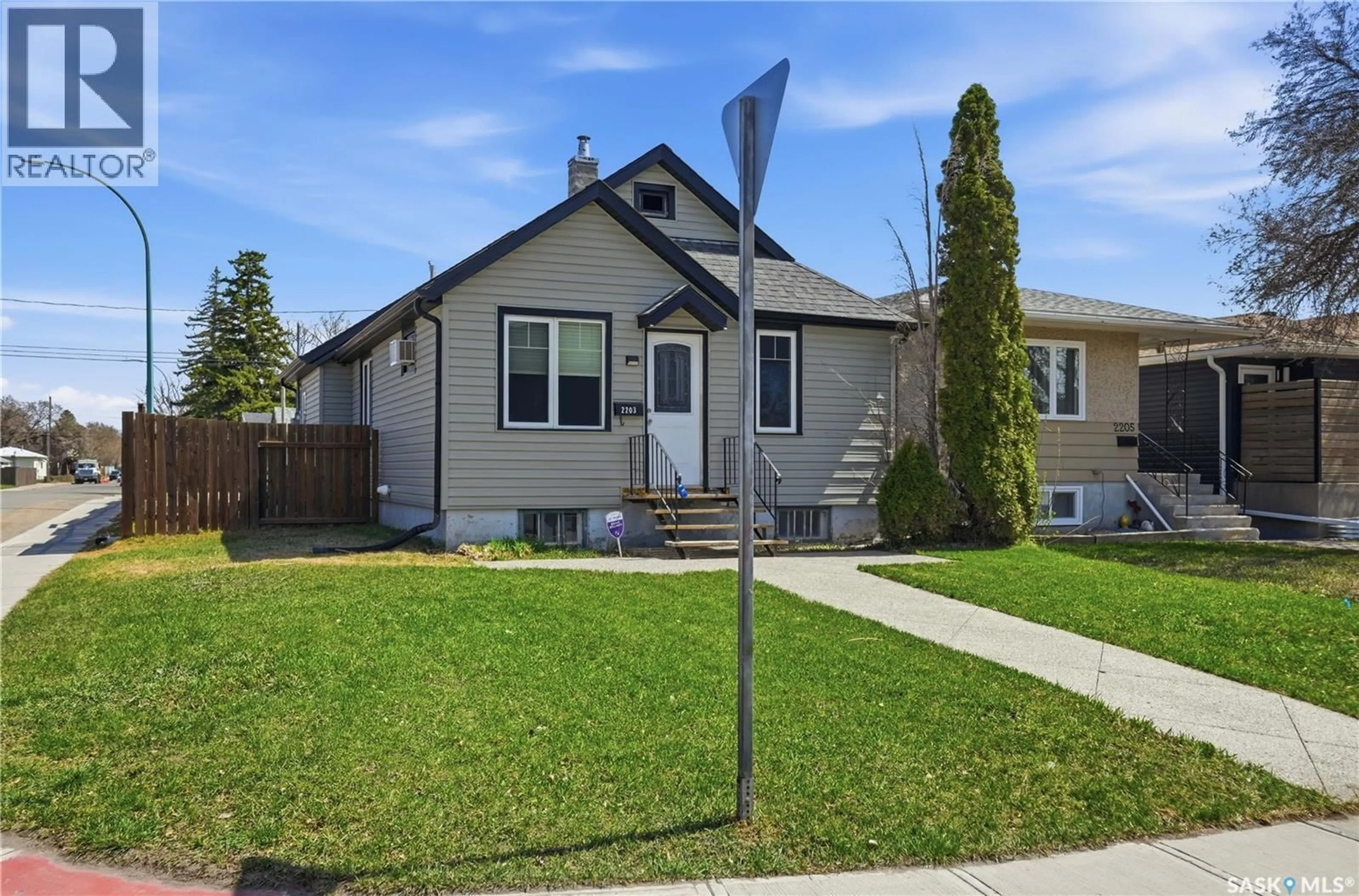 Home with vinyl exterior material, street for 2203 LINDSAY STREET, Regina Saskatchewan S4N3C2