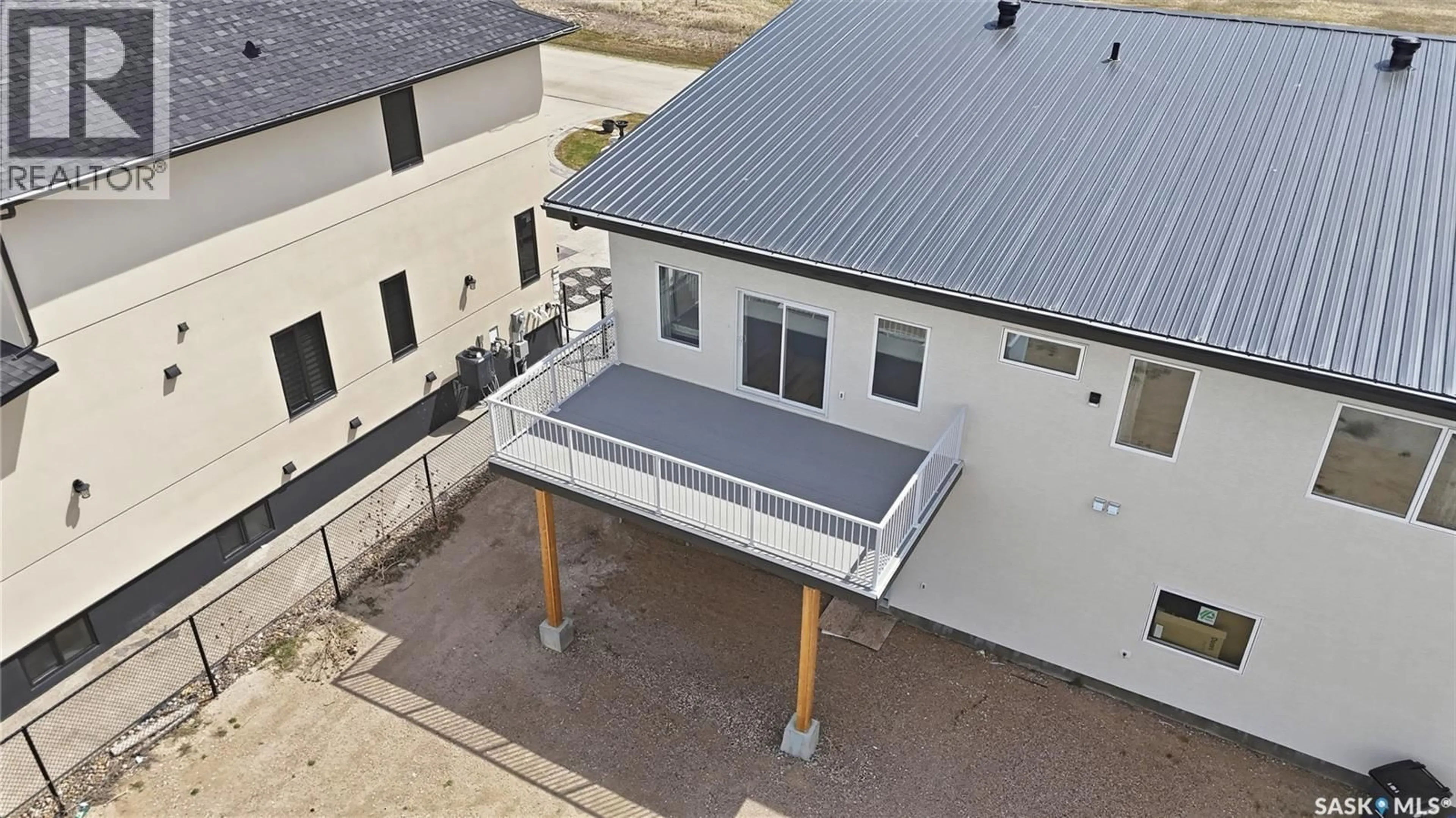 A pic from outside/outdoor area/front of a property/back of a property/a pic from drone, building for 716 EMERALD PARK ROAD, Edenwold Rm No.158 Saskatchewan S4L0C4