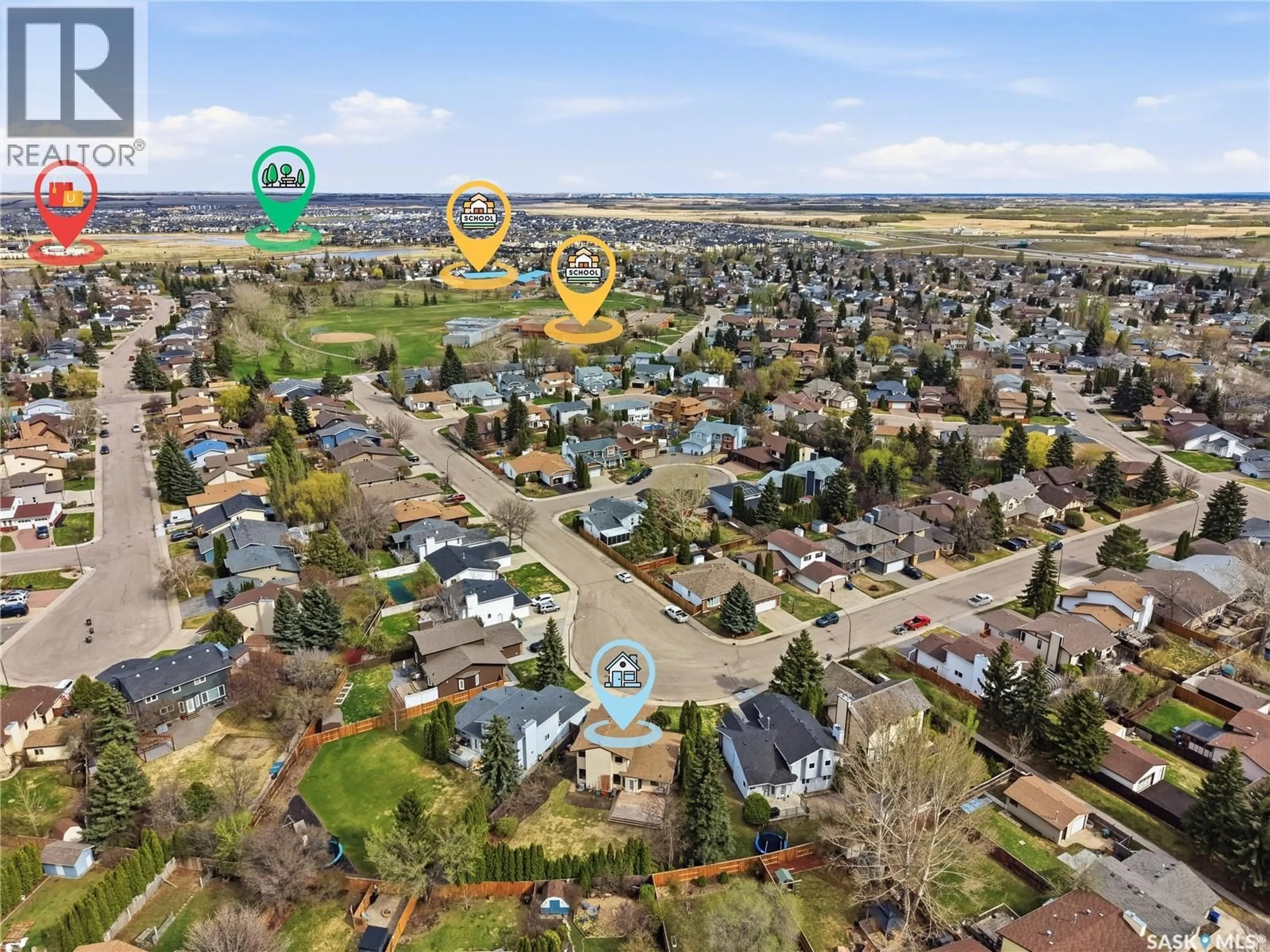 A pic from outside/outdoor area/front of a property/back of a property/a pic from drone, street for 540 NESSLIN CRESCENT, Saskatoon Saskatchewan S7J4V5