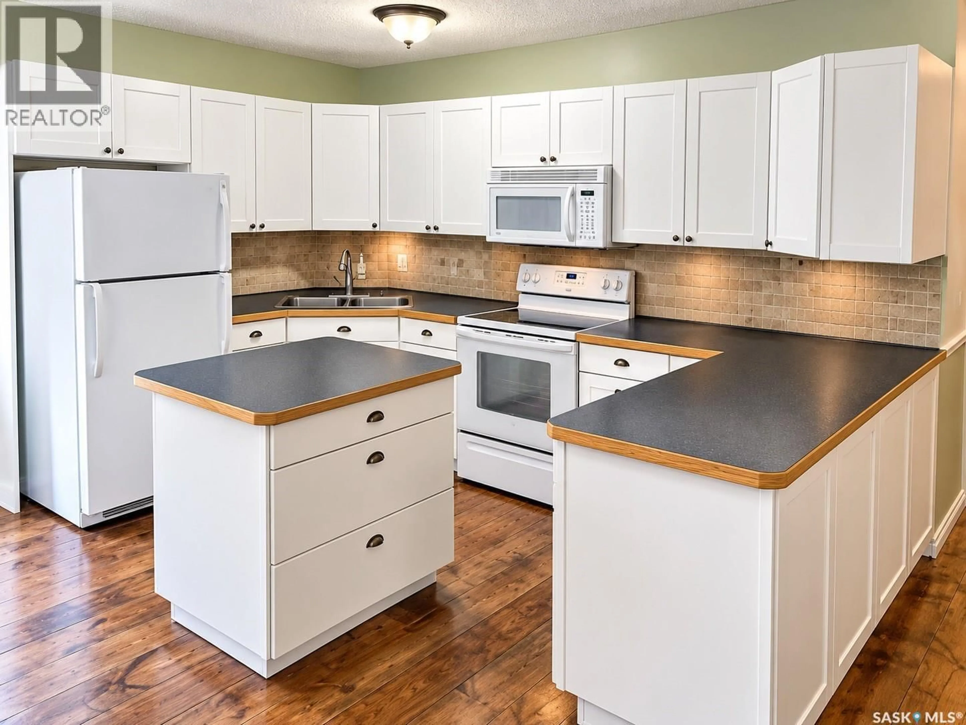 Standard kitchen, wood/laminate floor for 23 265 HIGHWAY, Candle Lake Saskatchewan S0J3E0