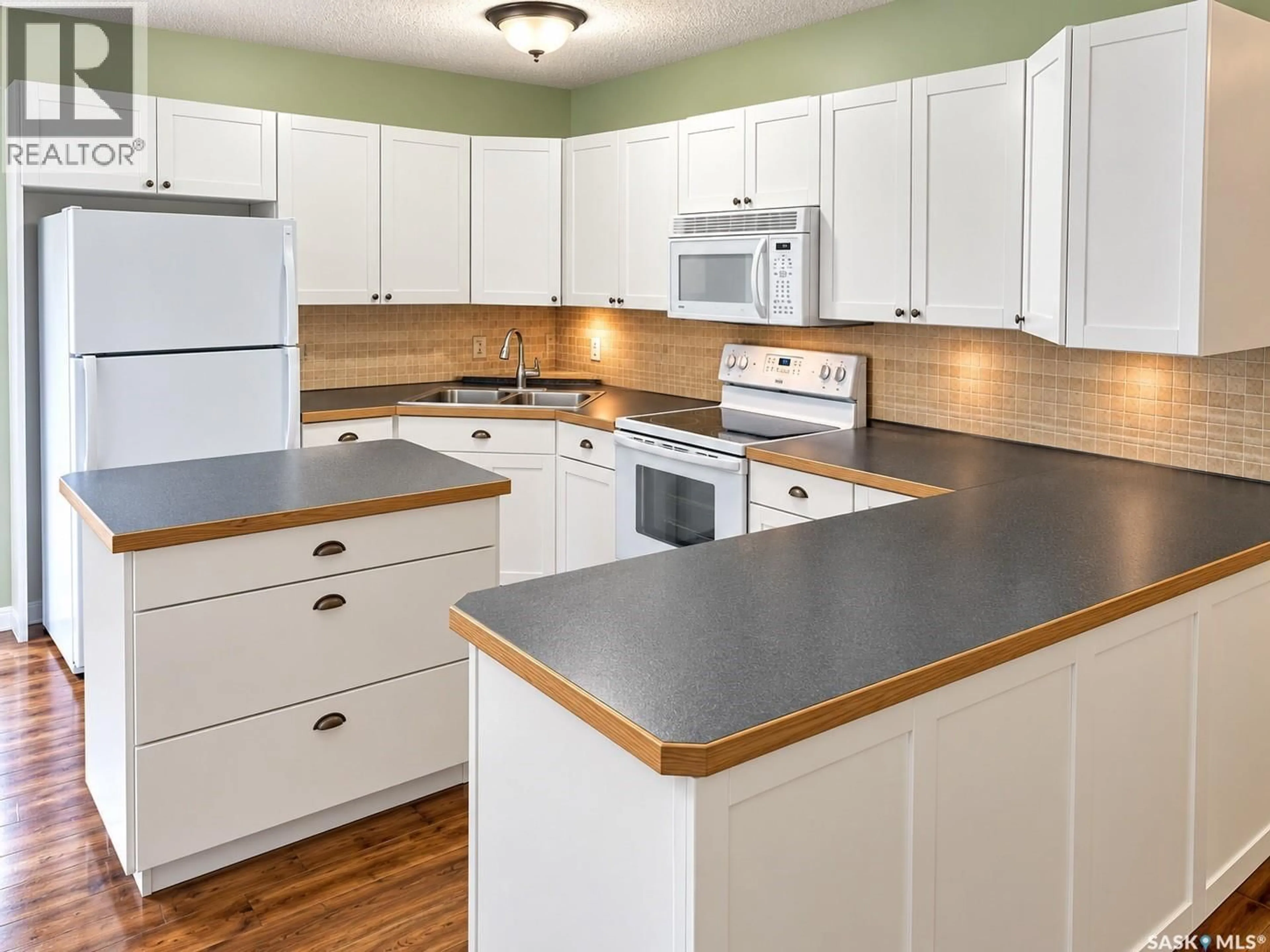 Standard kitchen, wood/laminate floor for 23 265 HIGHWAY, Candle Lake Saskatchewan S0J3E0