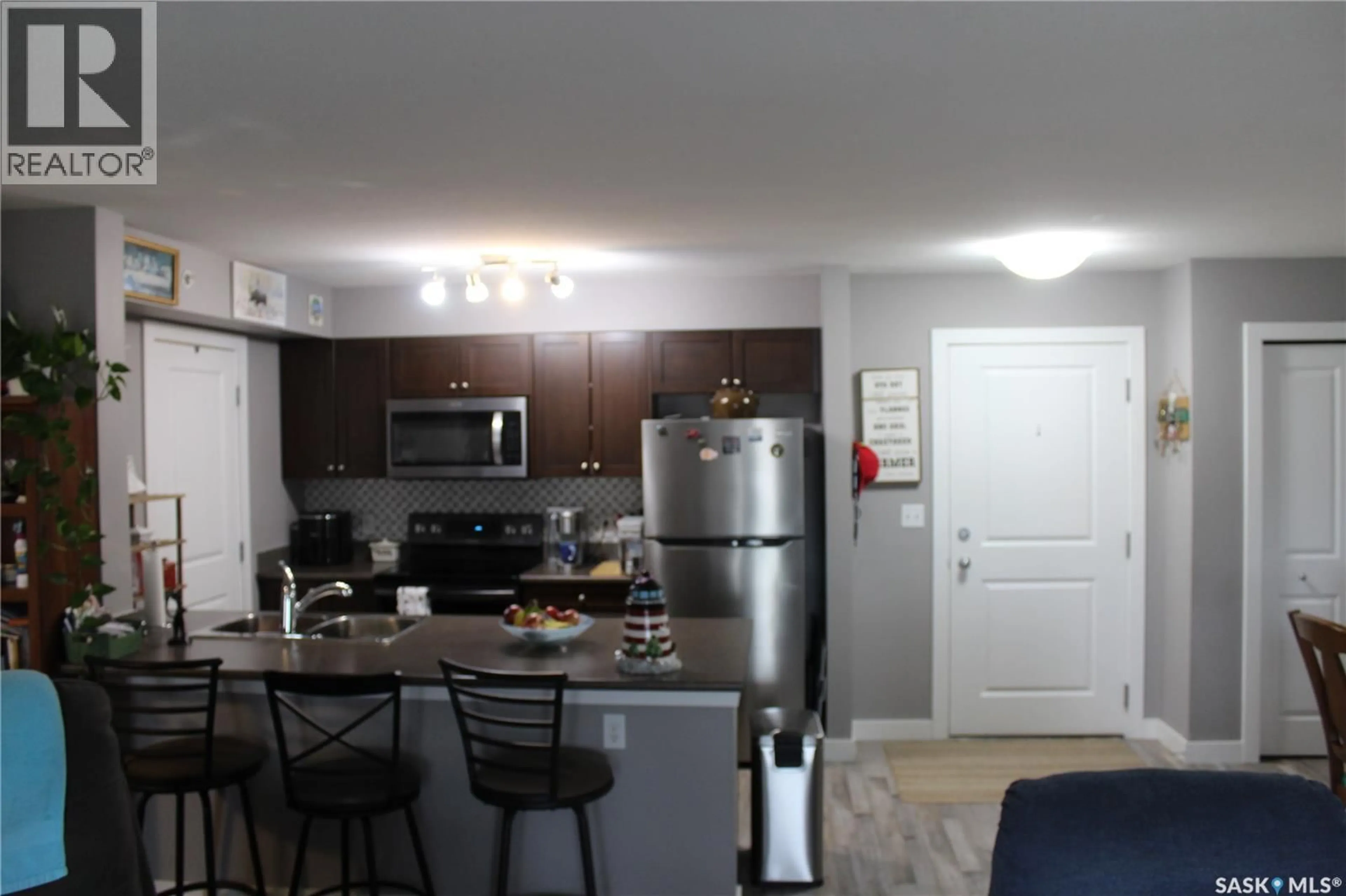 Open concept kitchen, unknown for 404 820 5TH STREET NE, Weyburn Saskatchewan S4H2V2