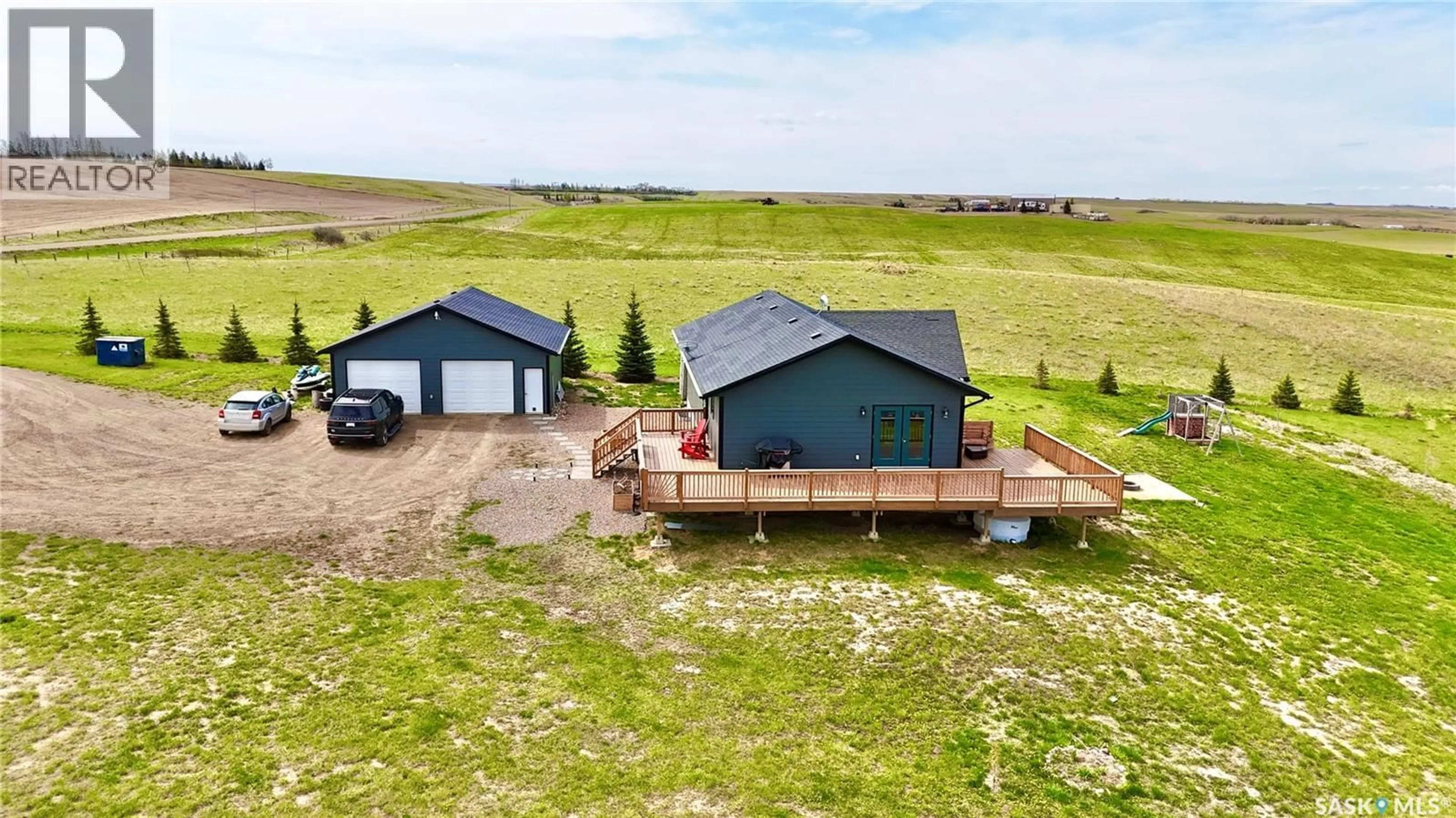 A pic from outside/outdoor area/front of a property/back of a property/a pic from drone, unknown for East - 1 HIGHWAY BRONCO MEMORIAL ACREAGE, Swift Current Rm No. 137 Saskatchewan S9H3X4