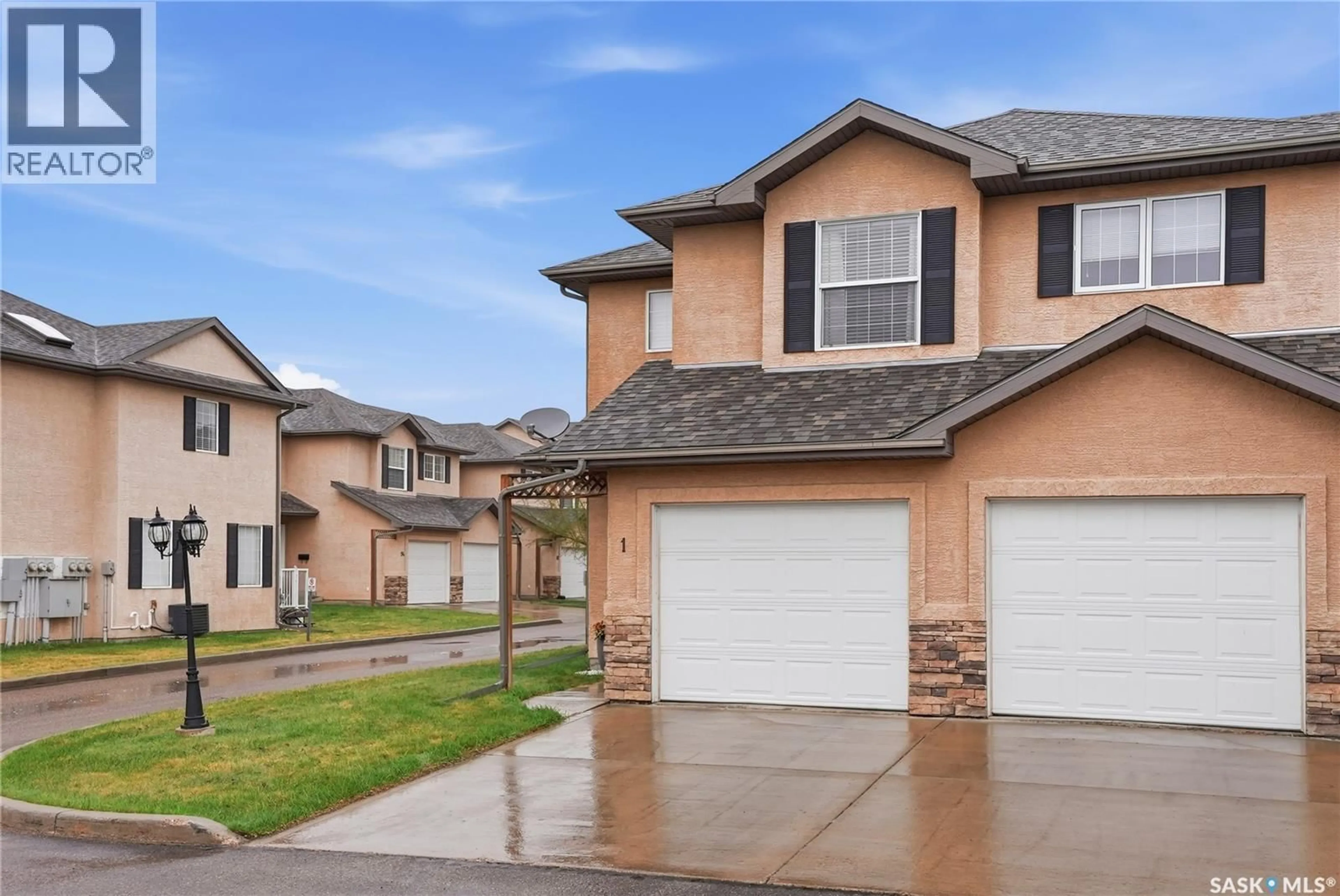 Home with vinyl exterior material, street for 1 118 PAWLYCHENKO LANE, Saskatoon Saskatchewan S7V1K1