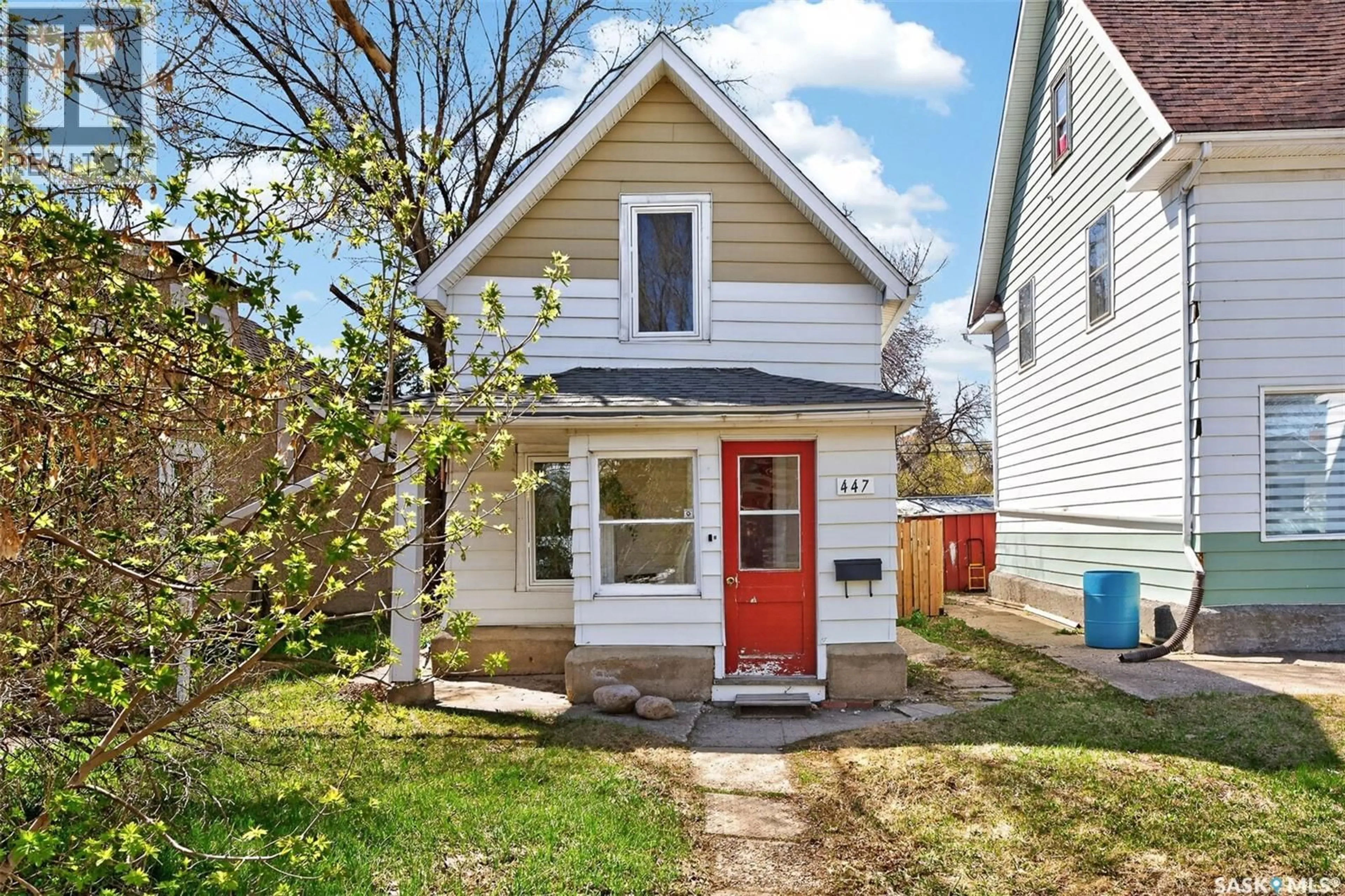 Home with vinyl exterior material, street for 447 ATHABASCA STREET, Moose Jaw Saskatchewan S6H2C4