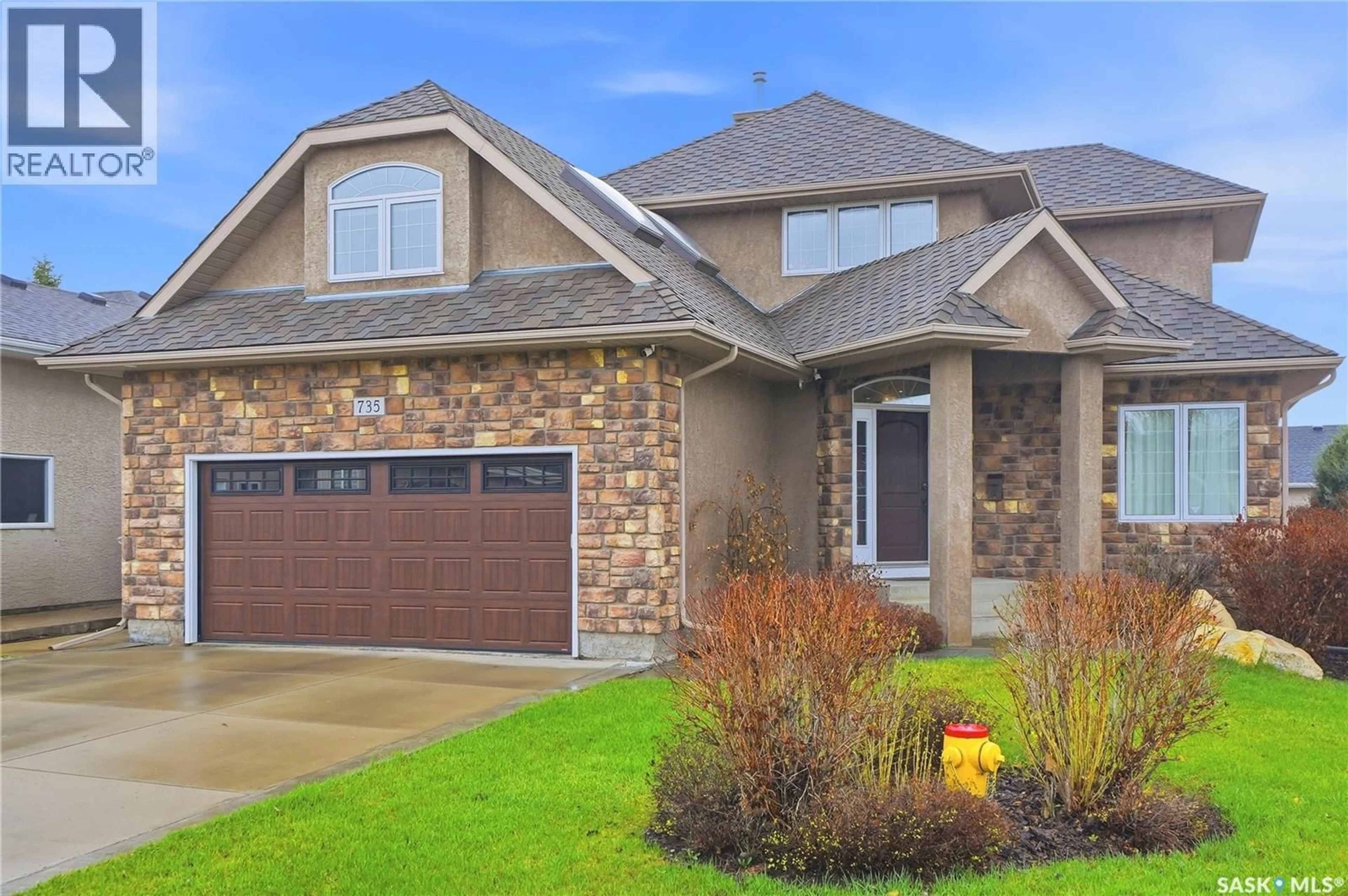 Home with brick exterior material, street for 735 WRIGHT CRESCENT, Saskatoon Saskatchewan S7N4T8