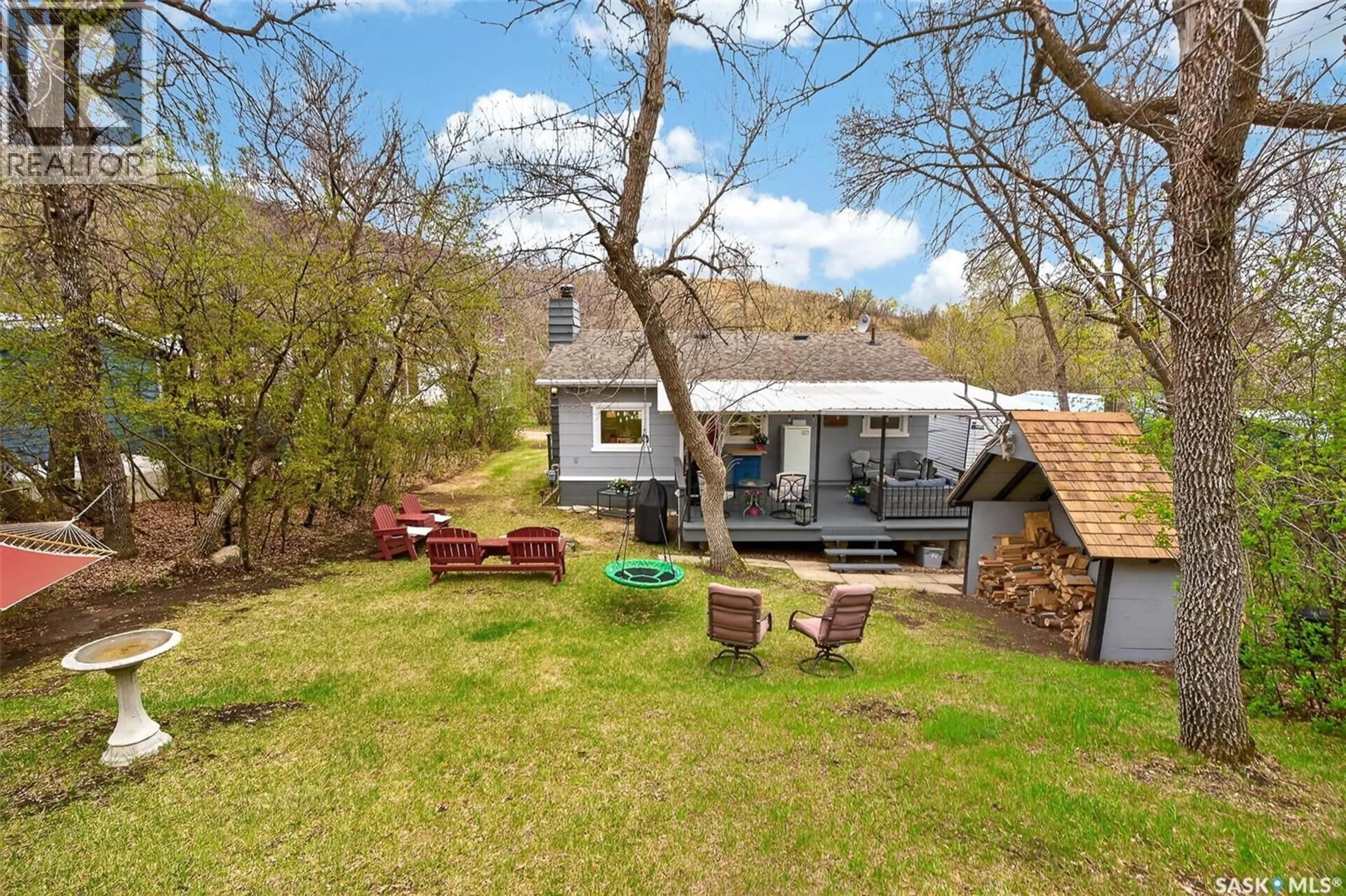 A pic from outside/outdoor area/front of a property/back of a property/a pic from drone, water/lake/river/ocean view for 407 HIDDEN RIDGE PLACE, Marquis Rm No. 191 Saskatchewan S0H2X0