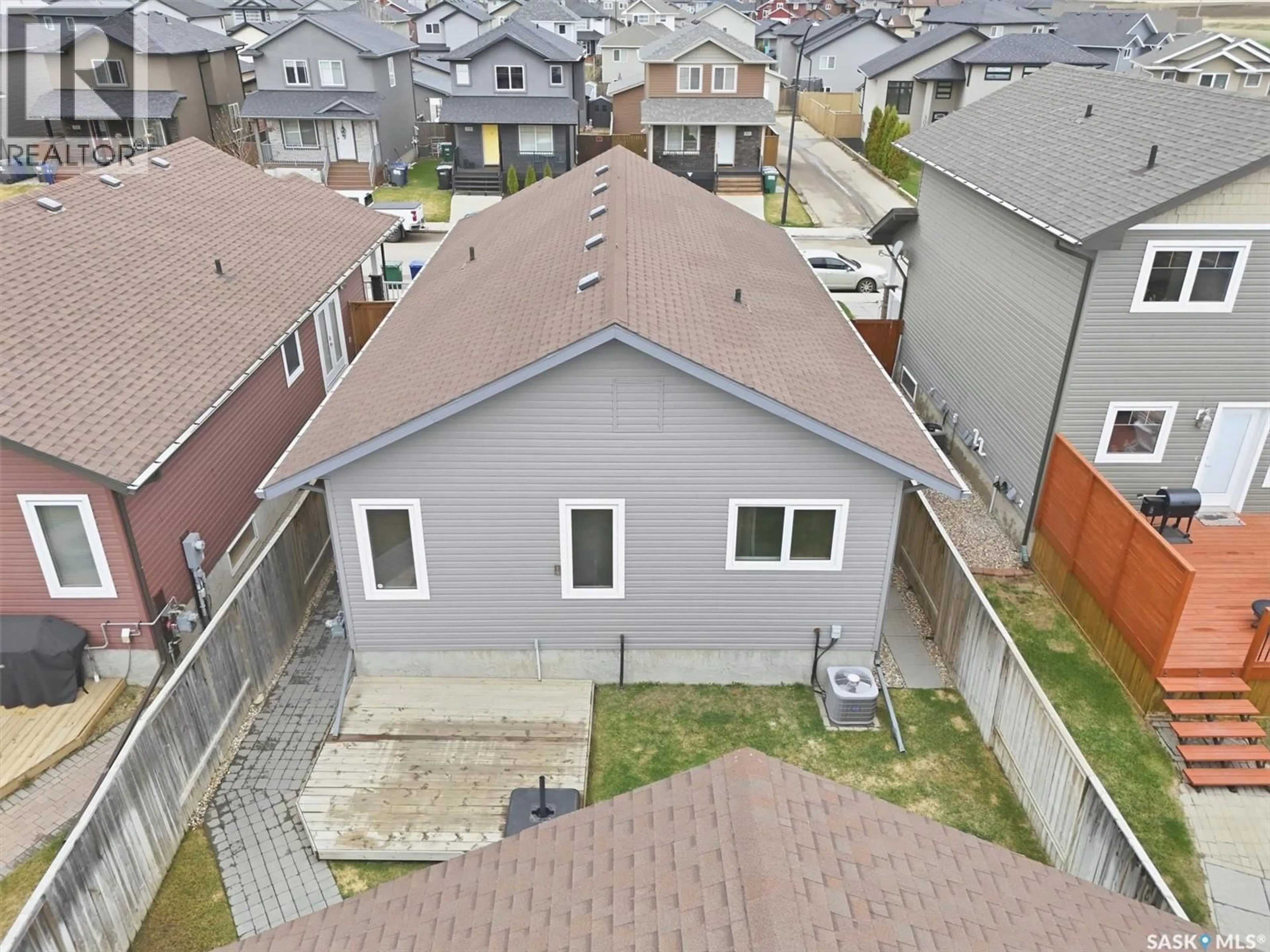 A pic from outside/outdoor area/front of a property/back of a property/a pic from drone, street for 234 KLASSEN CRESCENT, Saskatoon Saskatchewan S7R0E9