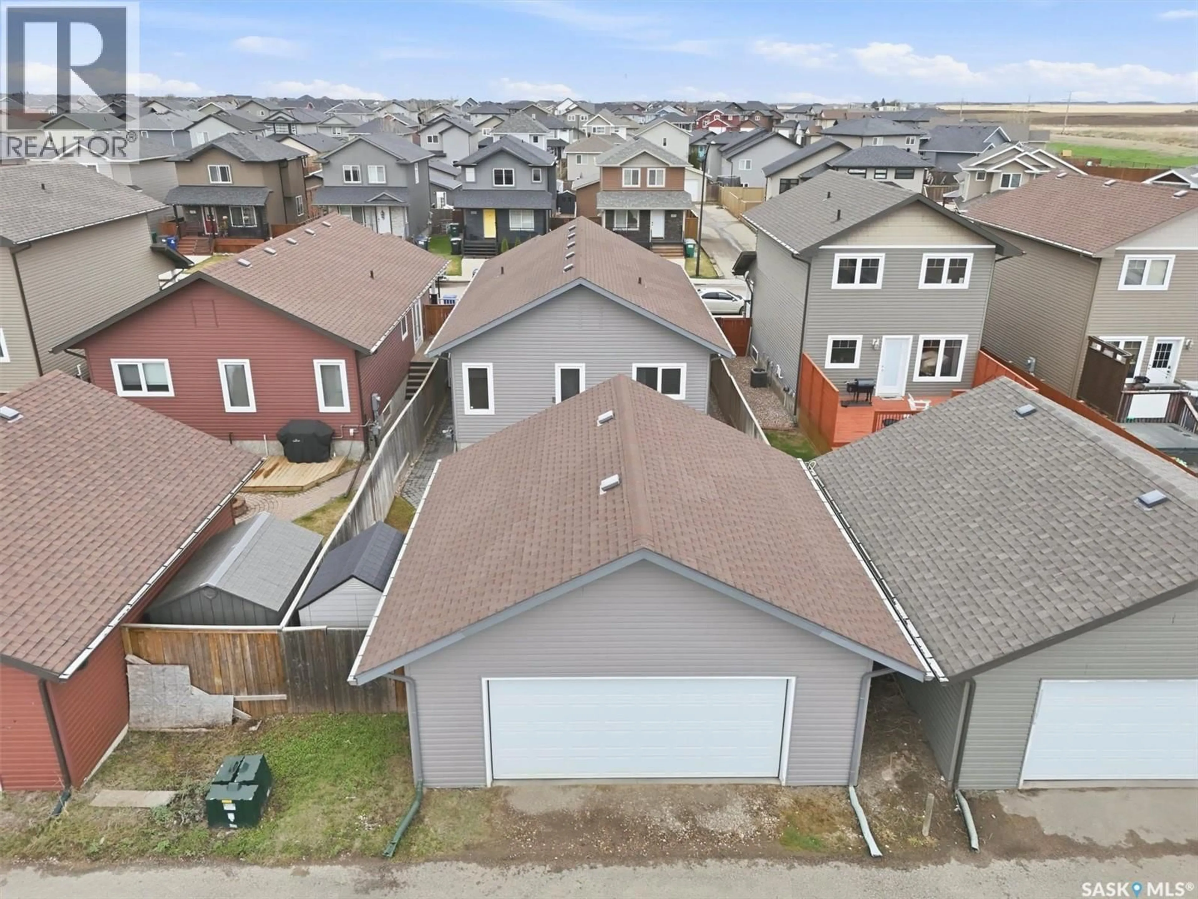 A pic from outside/outdoor area/front of a property/back of a property/a pic from drone, street for 234 KLASSEN CRESCENT, Saskatoon Saskatchewan S7R0E9