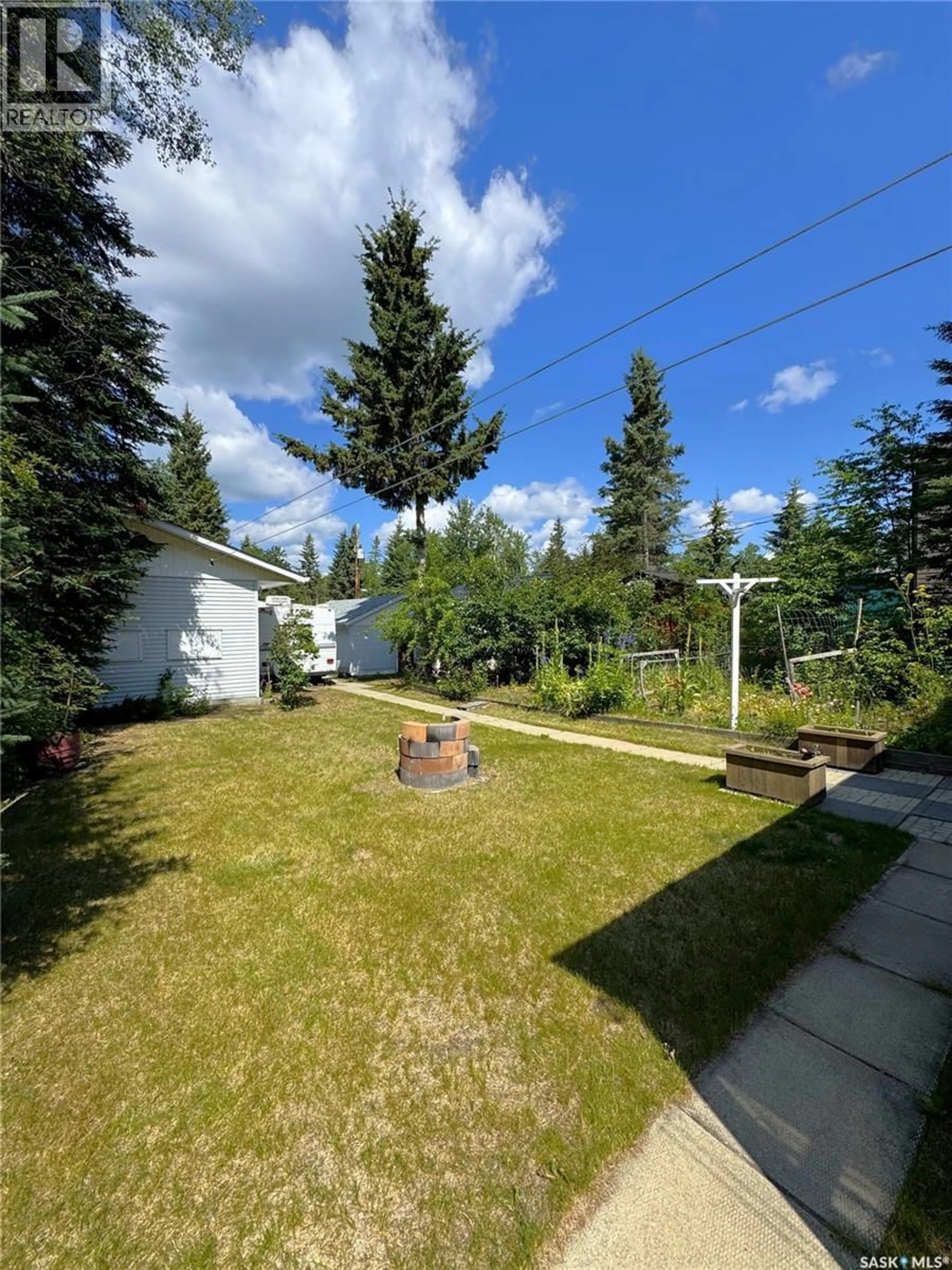 A pic from outside/outdoor area/front of a property/back of a property/a pic from drone, forest/trees view for 308 FRANCIS AVENUE, Lakeland Rm No. 521 Saskatchewan S0J0N0