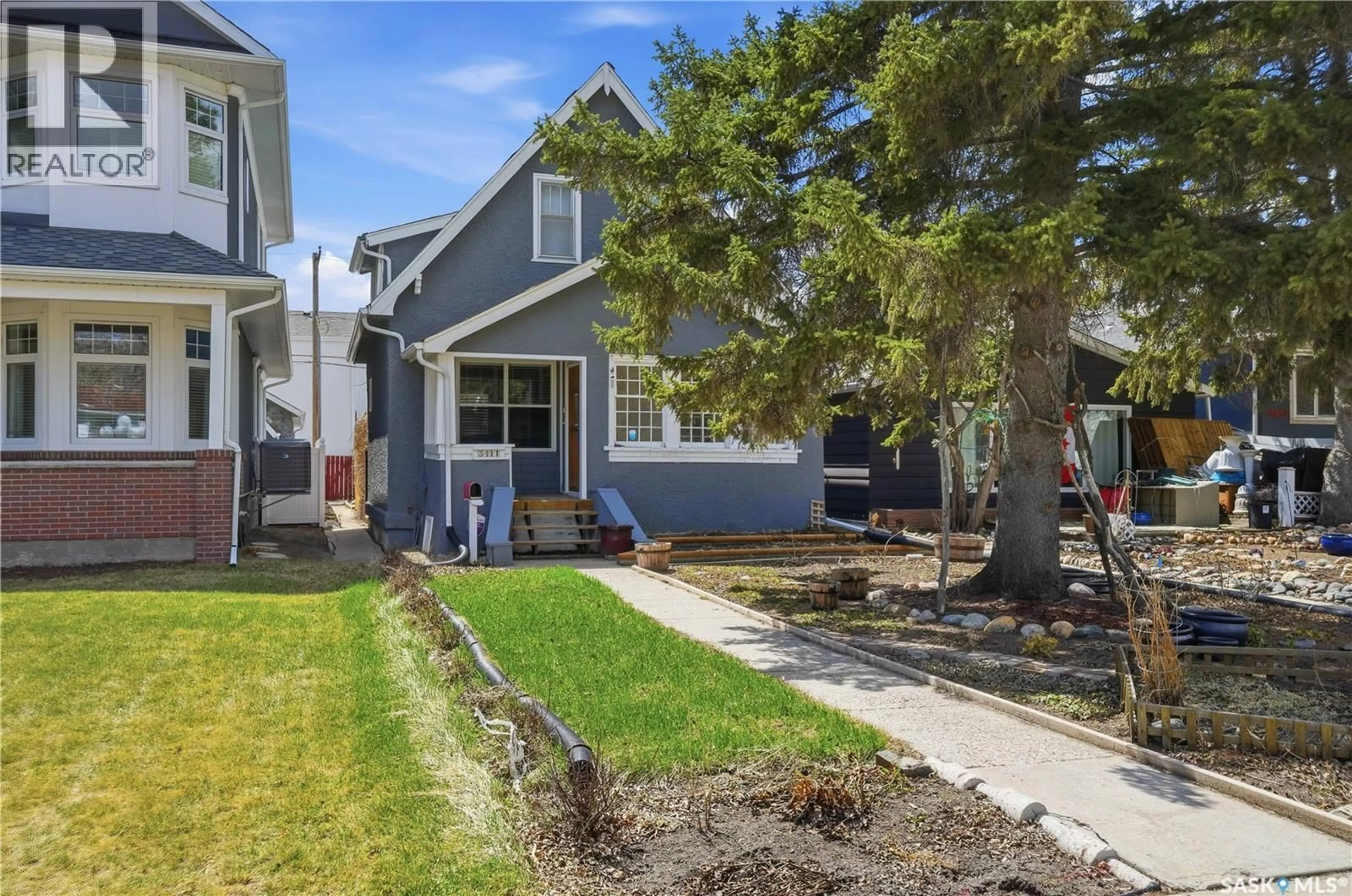 Home with vinyl exterior material, street for 3411 MCCALLUM AVENUE, Regina Saskatchewan S4S0S2
