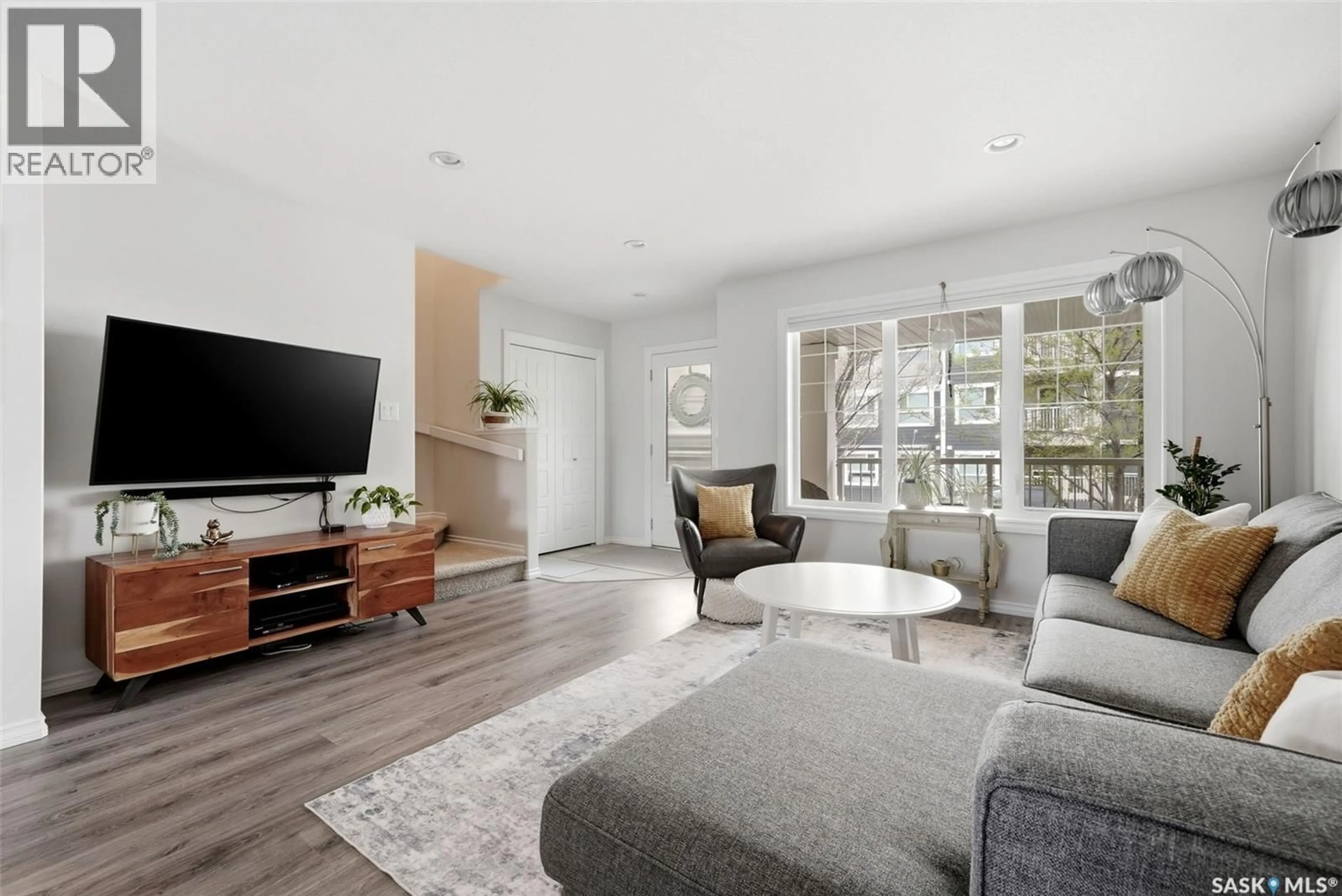 Living room with furniture, unknown for 5564 PREFONTAINE AVENUE, Regina Saskatchewan S4W0M8