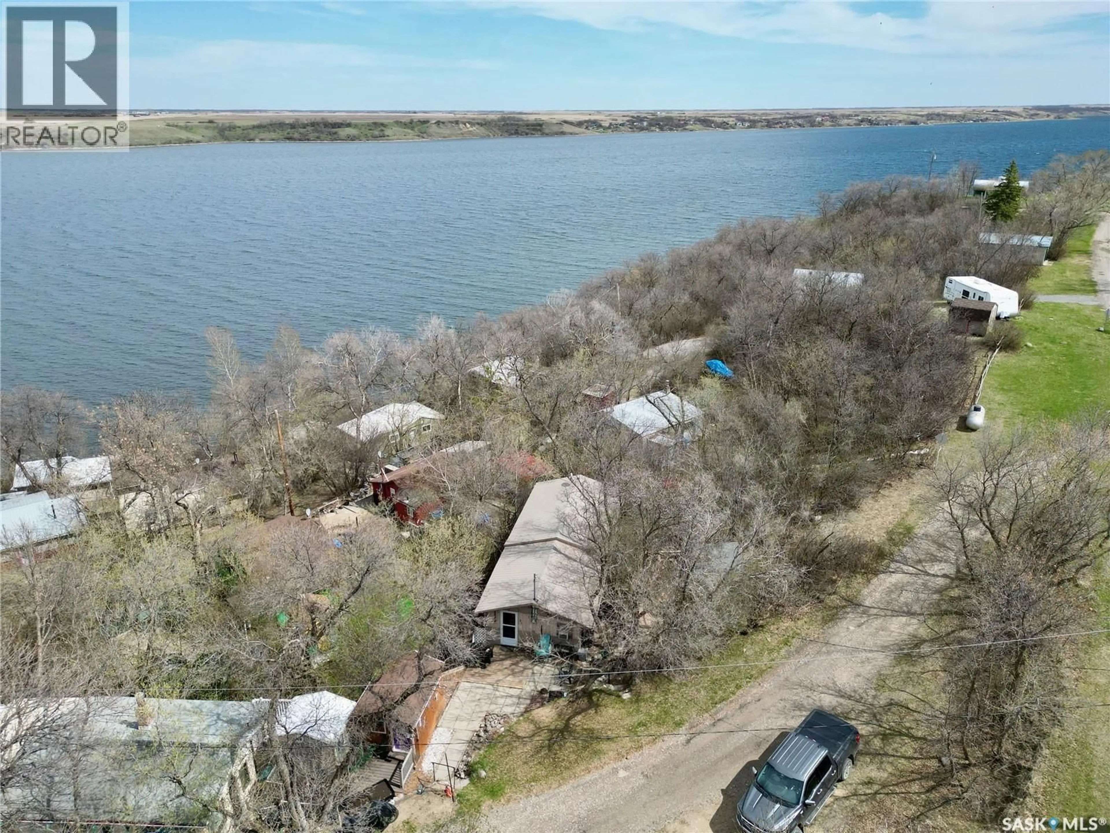 A pic from outside/outdoor area/front of a property/back of a property/a pic from drone, water/lake/river/ocean view for 51 LAKEVIEW ROAD, Grandview Beach Saskatchewan S0G1C0