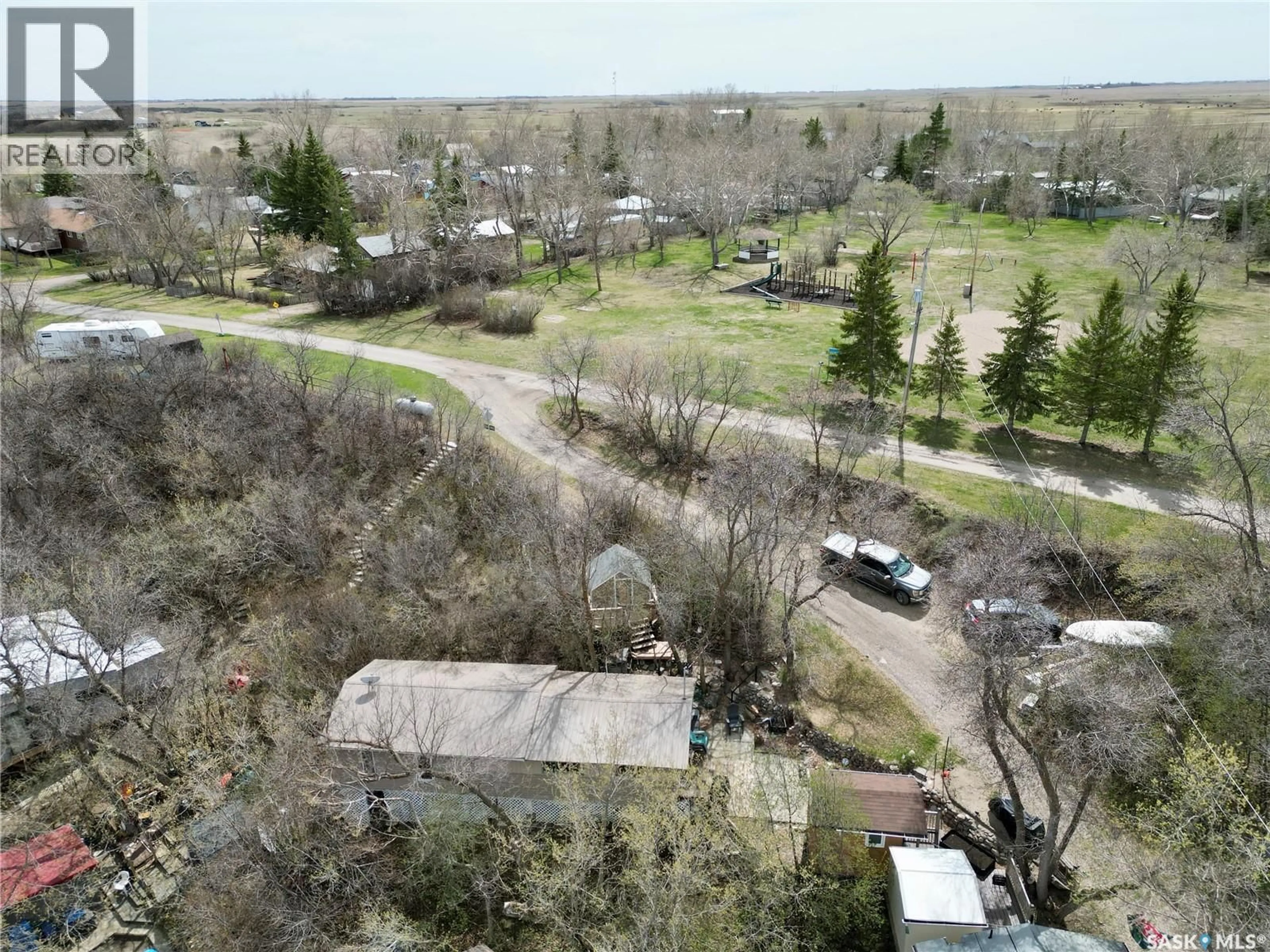 A pic from outside/outdoor area/front of a property/back of a property/a pic from drone, forest/trees view for 51 LAKEVIEW ROAD, Grandview Beach Saskatchewan S0G1C0