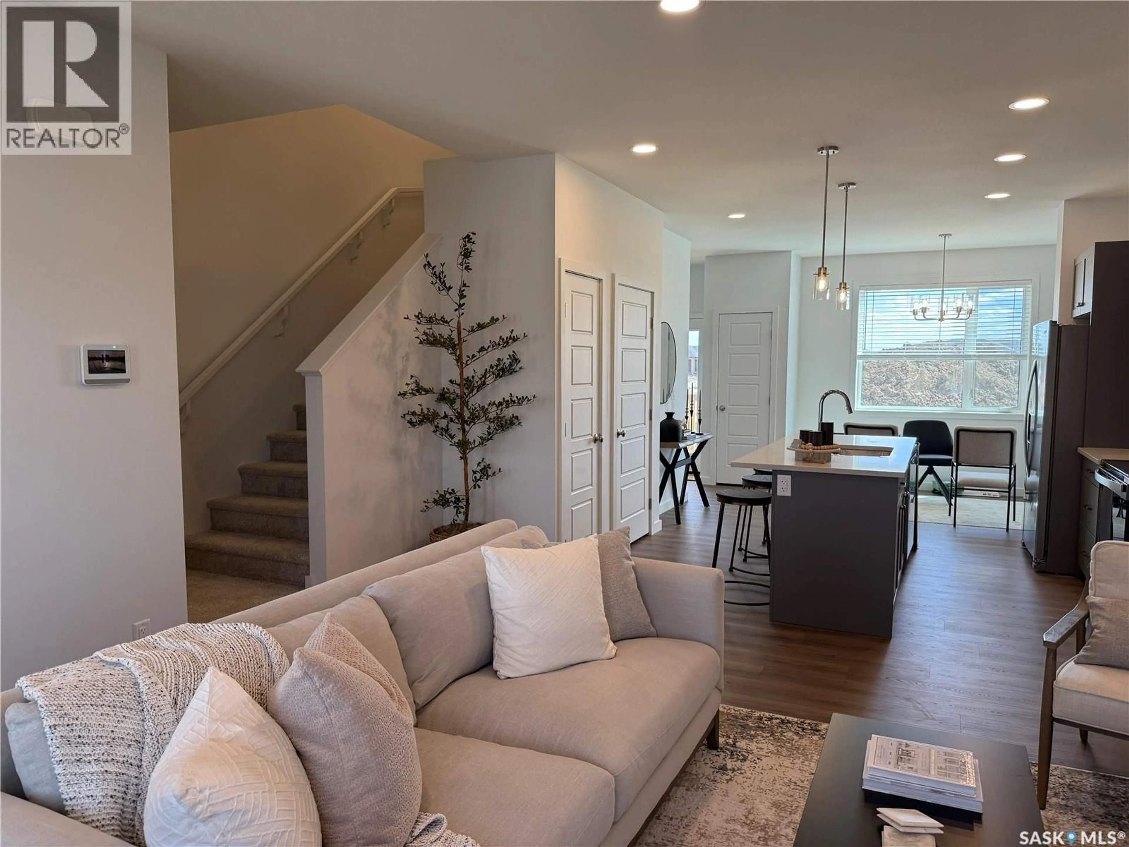 Living room with furniture, unknown for 75 TASKAMANWA TERRACE, Saskatoon Saskatchewan S7V1Z7