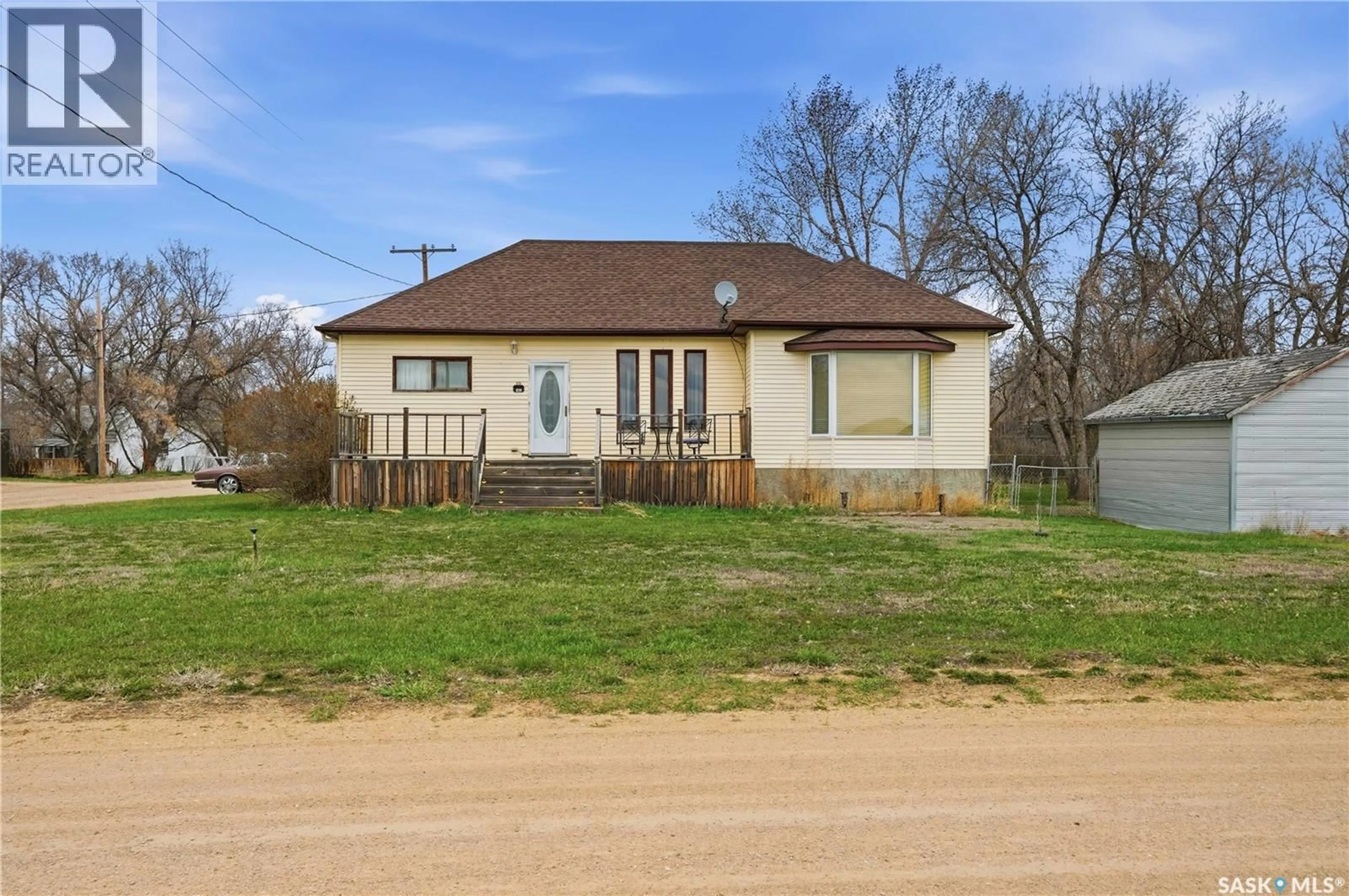 A pic from outside/outdoor area/front of a property/back of a property/a pic from drone, street for 210 RAILWAY AVENUE, Mortlach Saskatchewan S0H3E0
