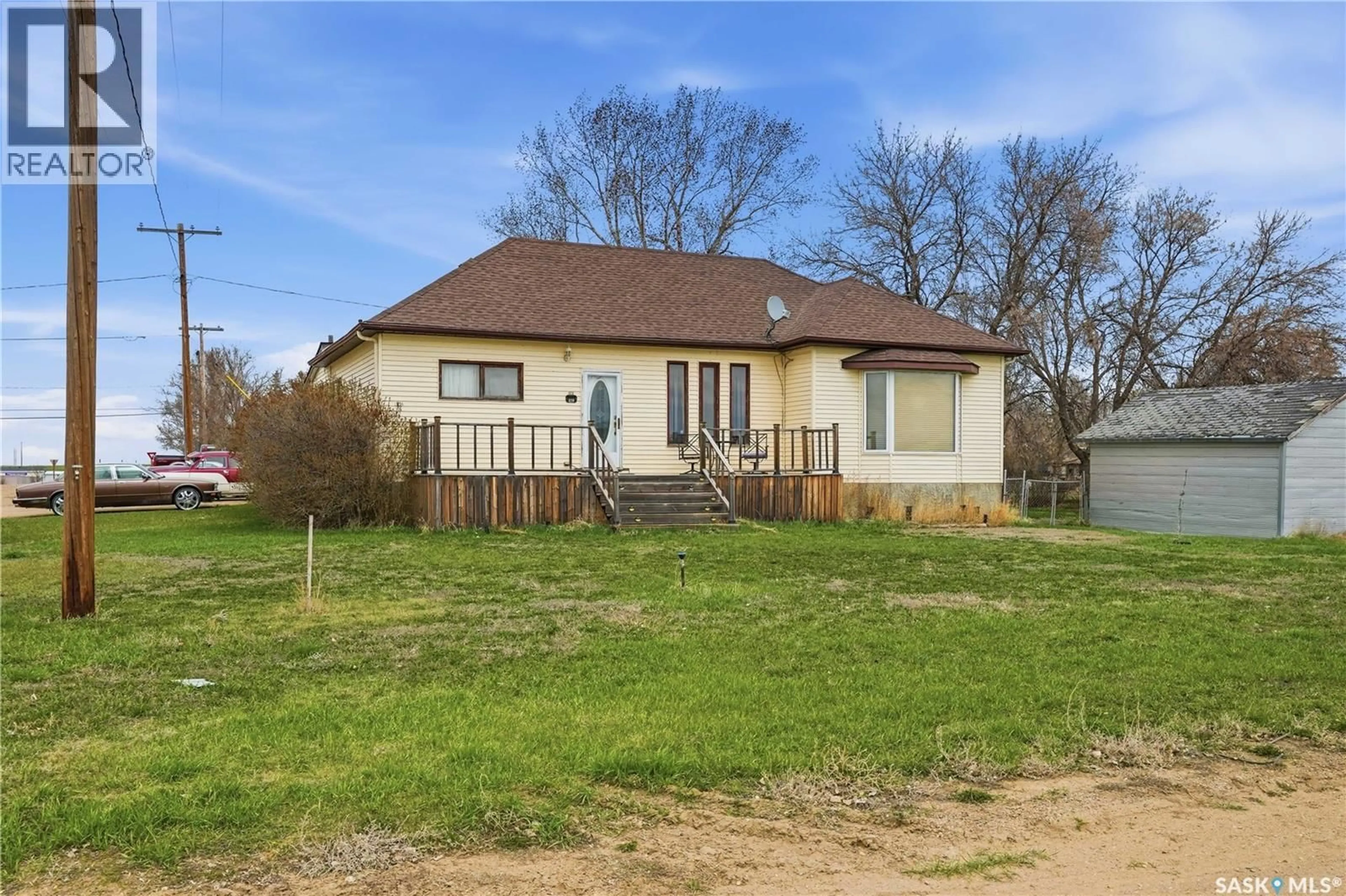 A pic from outside/outdoor area/front of a property/back of a property/a pic from drone, unknown for 210 RAILWAY AVENUE, Mortlach Saskatchewan S0H3E0