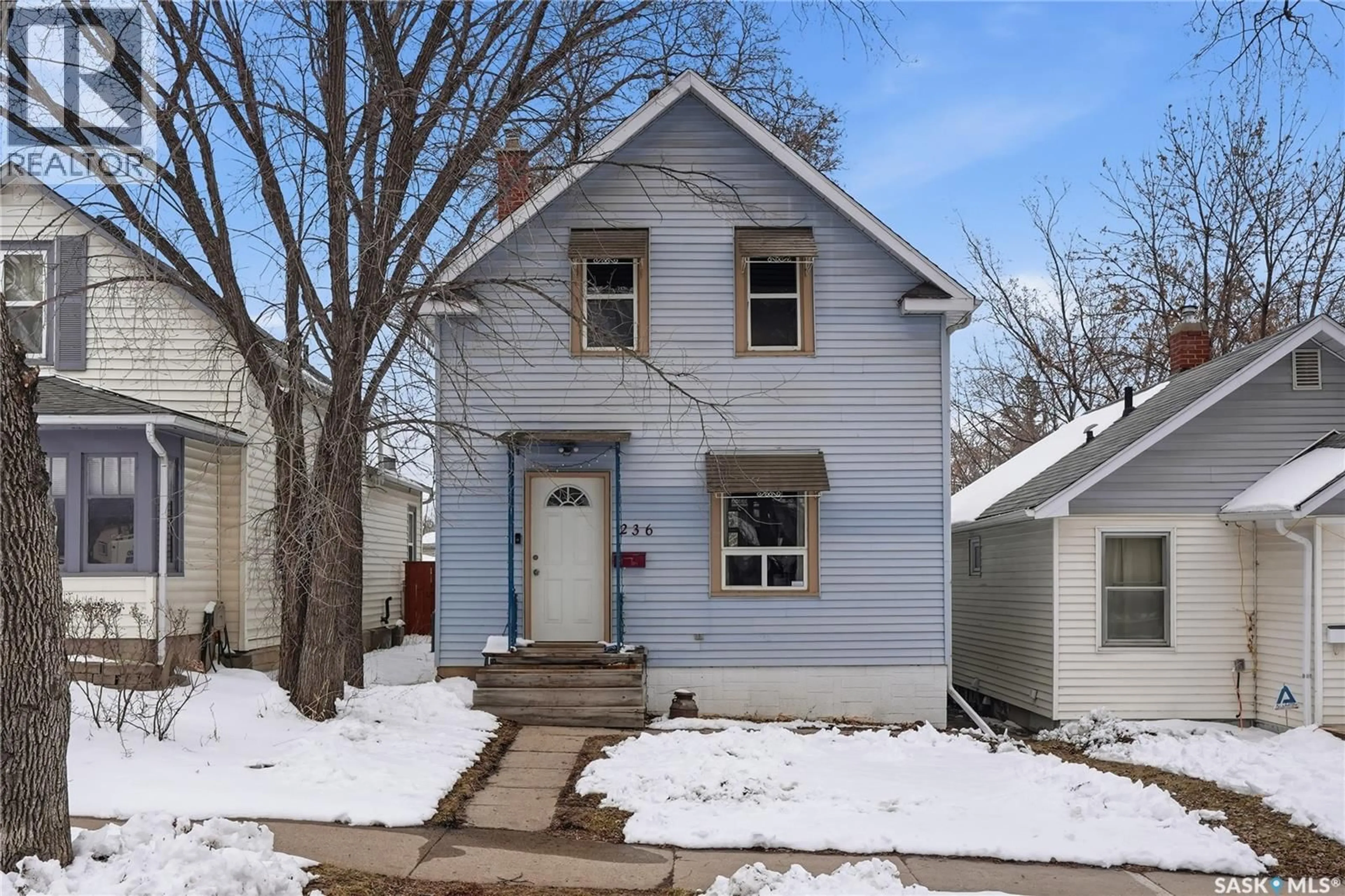 Home with vinyl exterior material, street for 236 I AVENUE, Saskatoon Saskatchewan S7L0G4