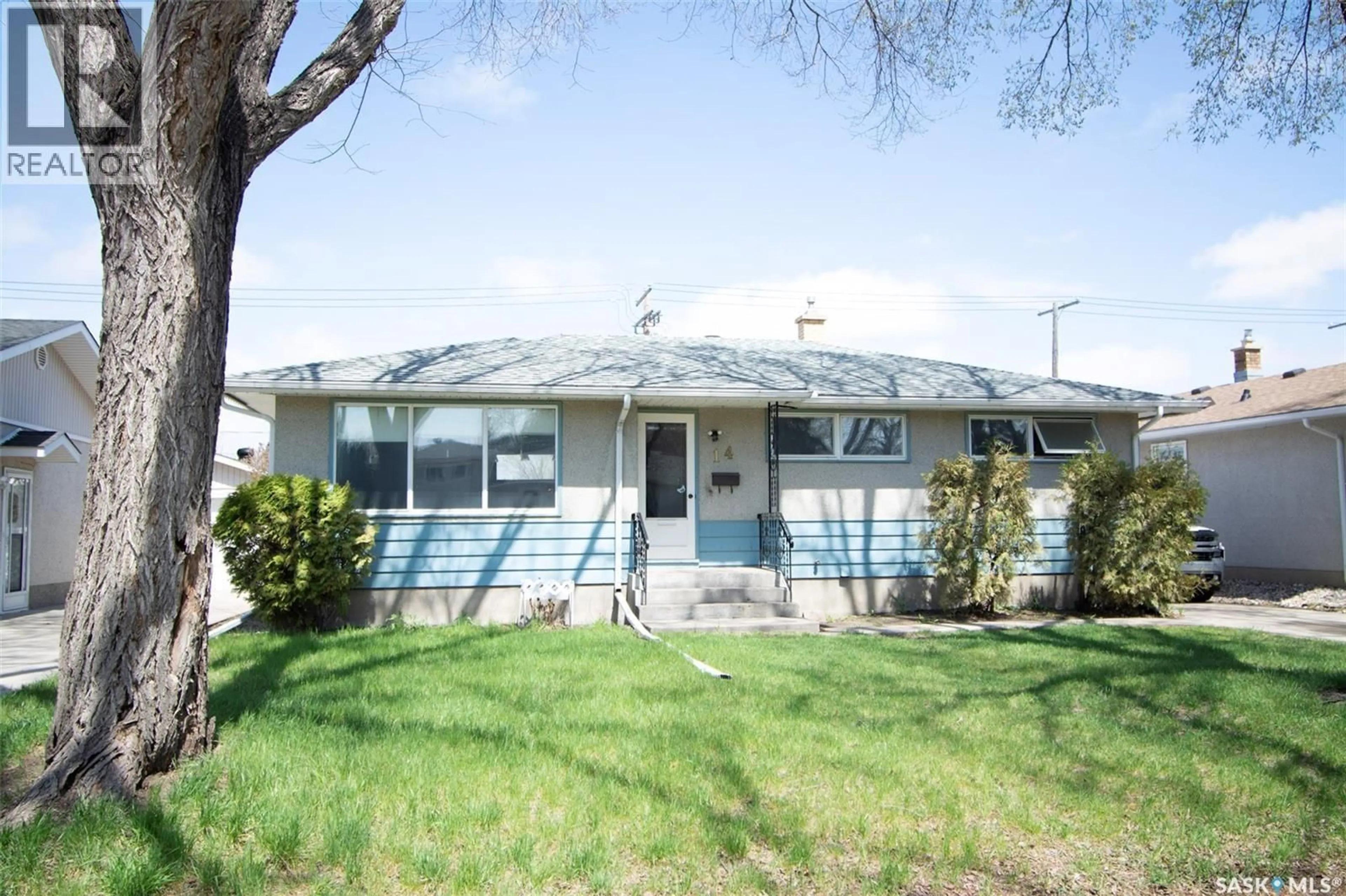 Home with vinyl exterior material, street for 14 WOODWARD AVENUE, Regina Saskatchewan S4R3H1