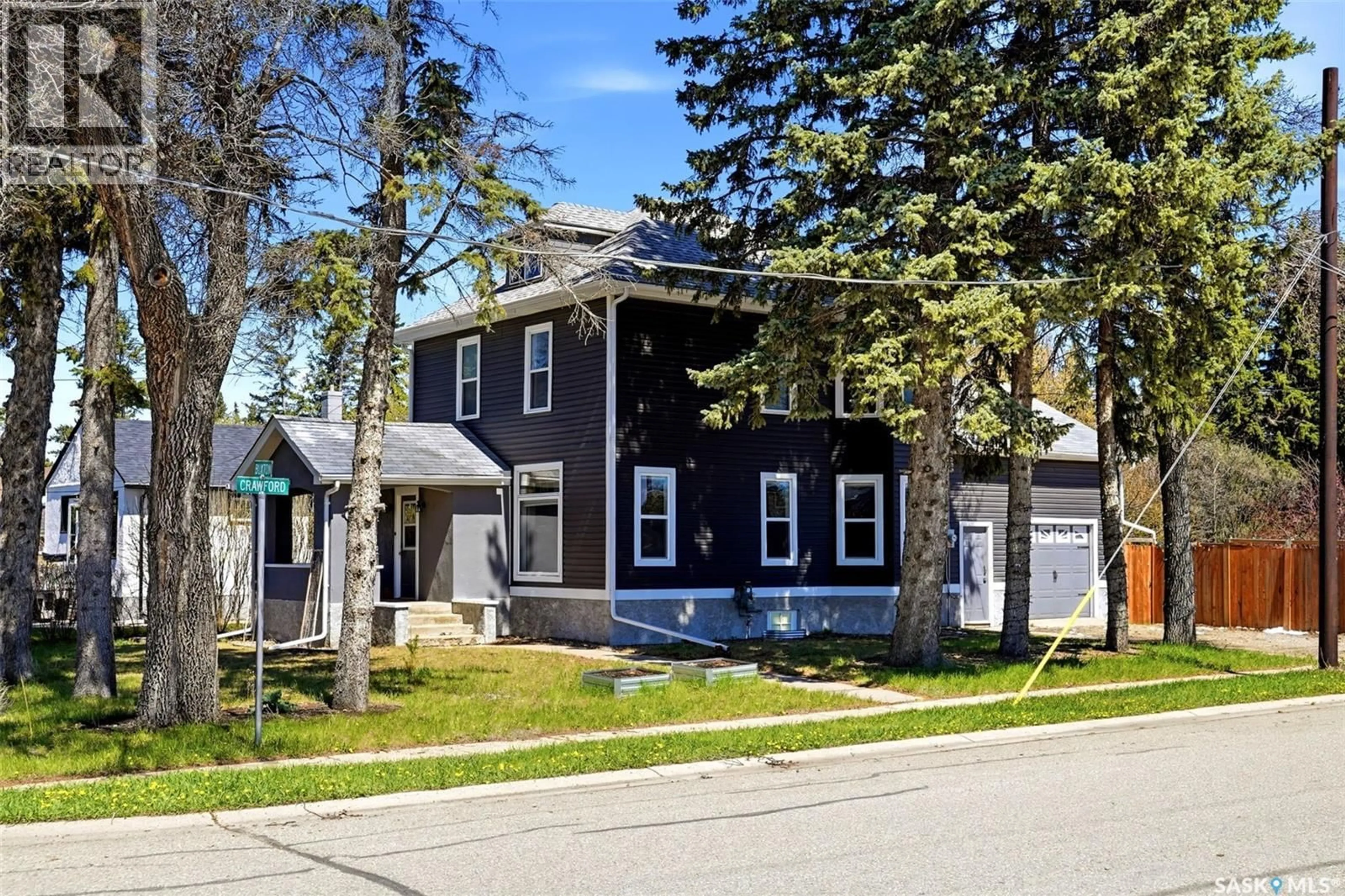 Home with vinyl exterior material, street for 1001 BUXTON STREET, Indian Head Saskatchewan S0G2K0
