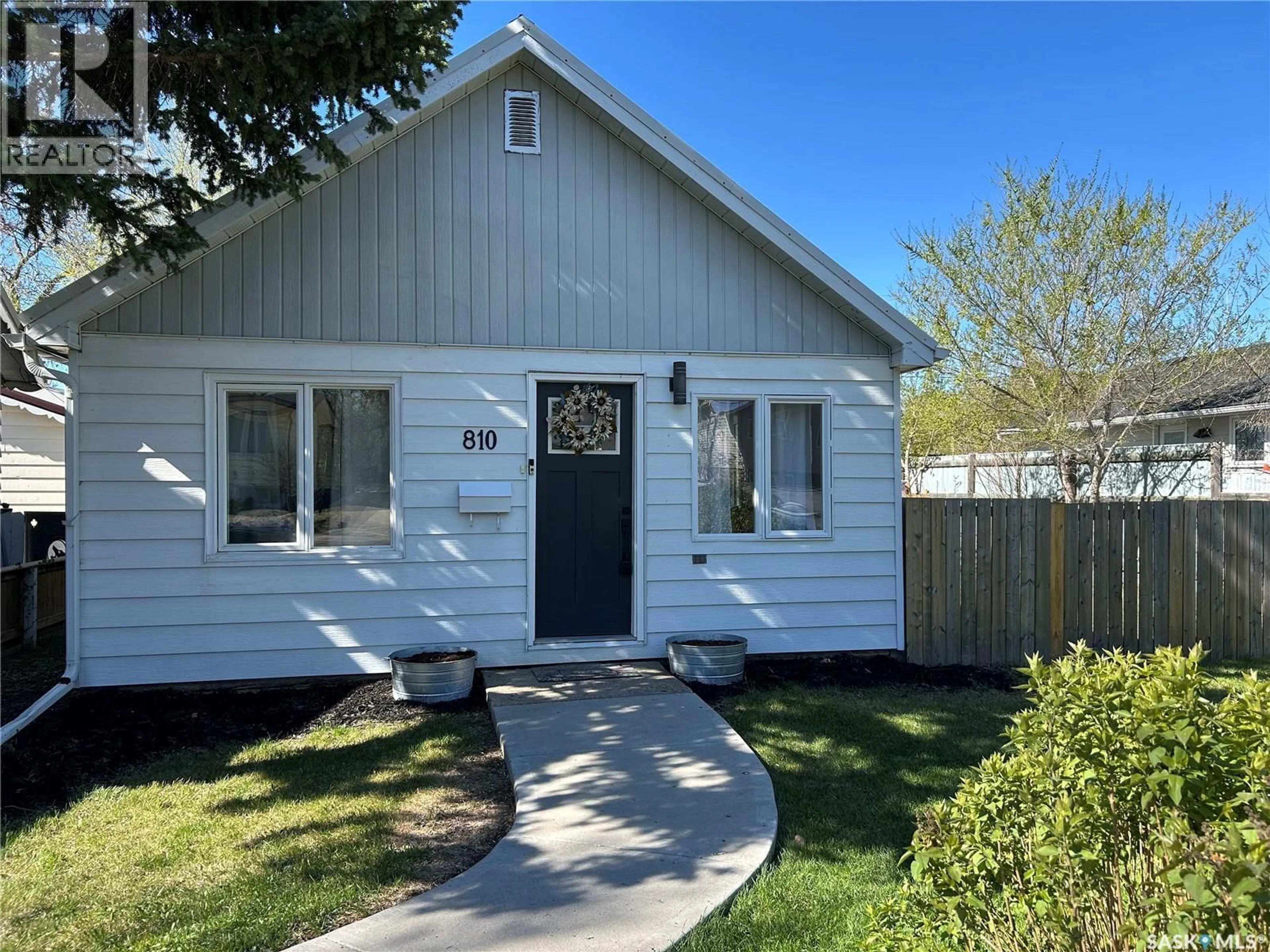 Home with vinyl exterior material, street for 810 1ST STREET, Estevan Saskatchewan S4A0G3