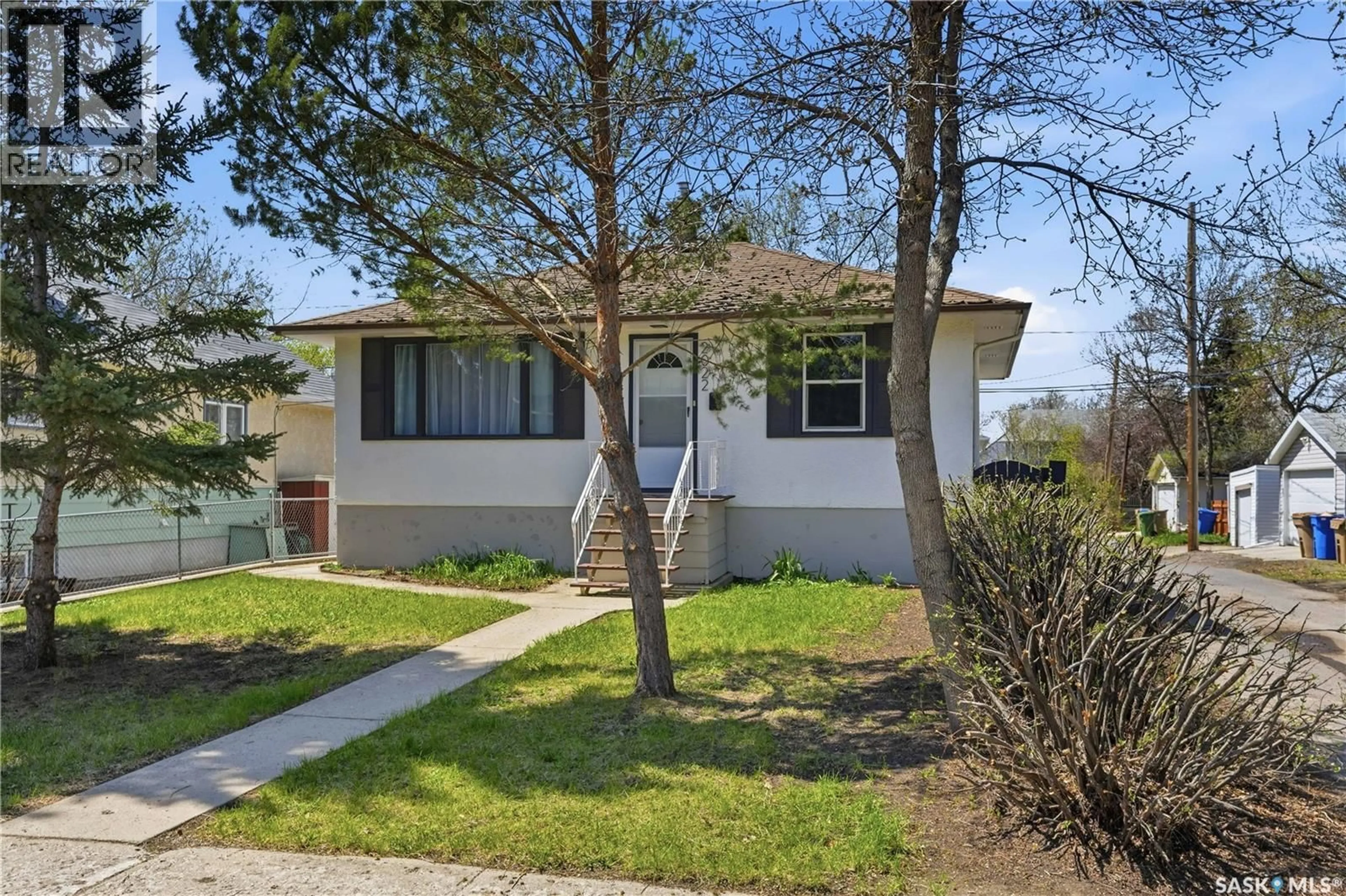 Home with vinyl exterior material, street for 2022 WASCANA STREET, Regina Saskatchewan S4T4J7