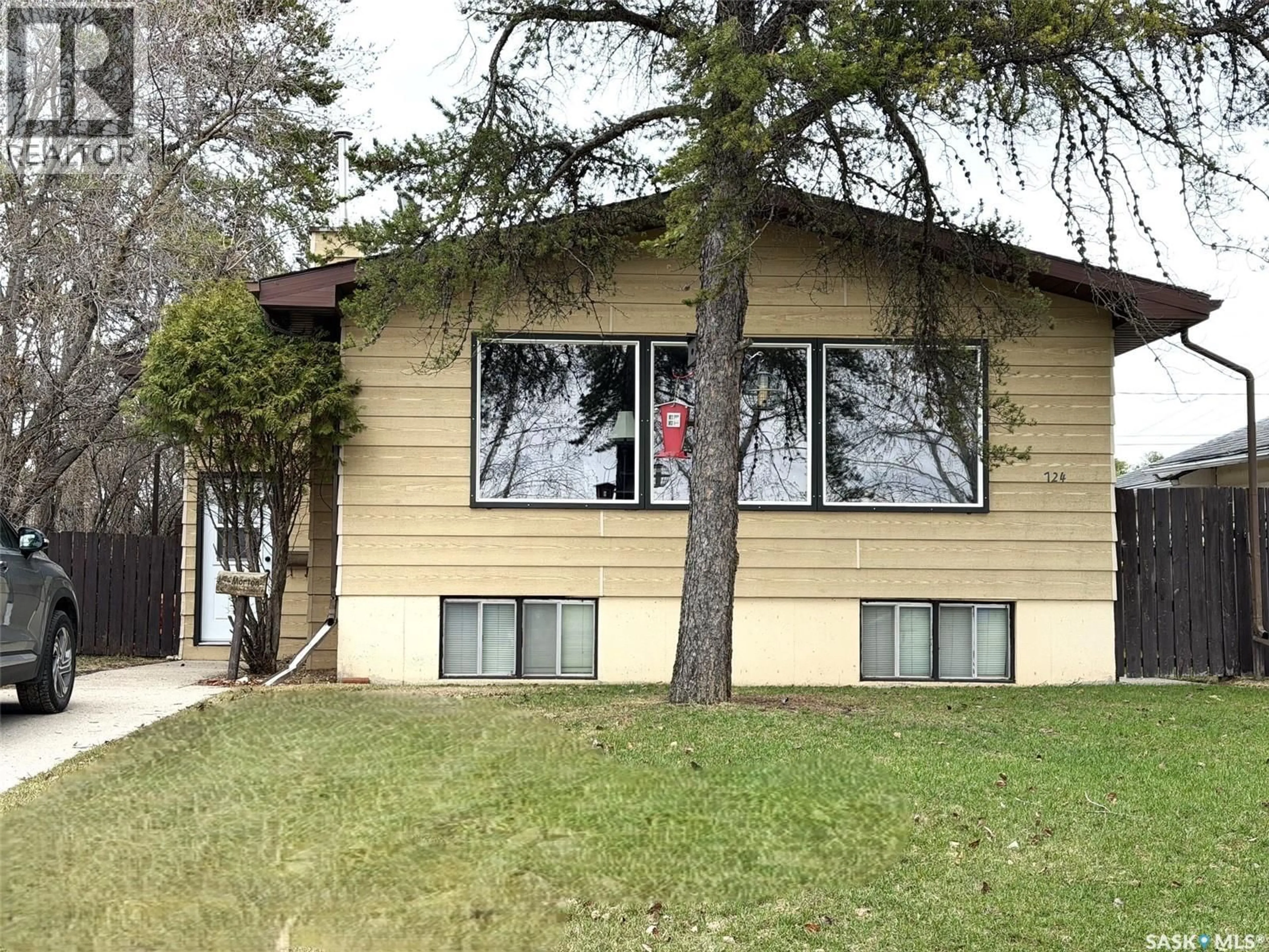 Home with vinyl exterior material, street for 724 PRINCE STREET, Hudson Bay Saskatchewan S0E0Y0