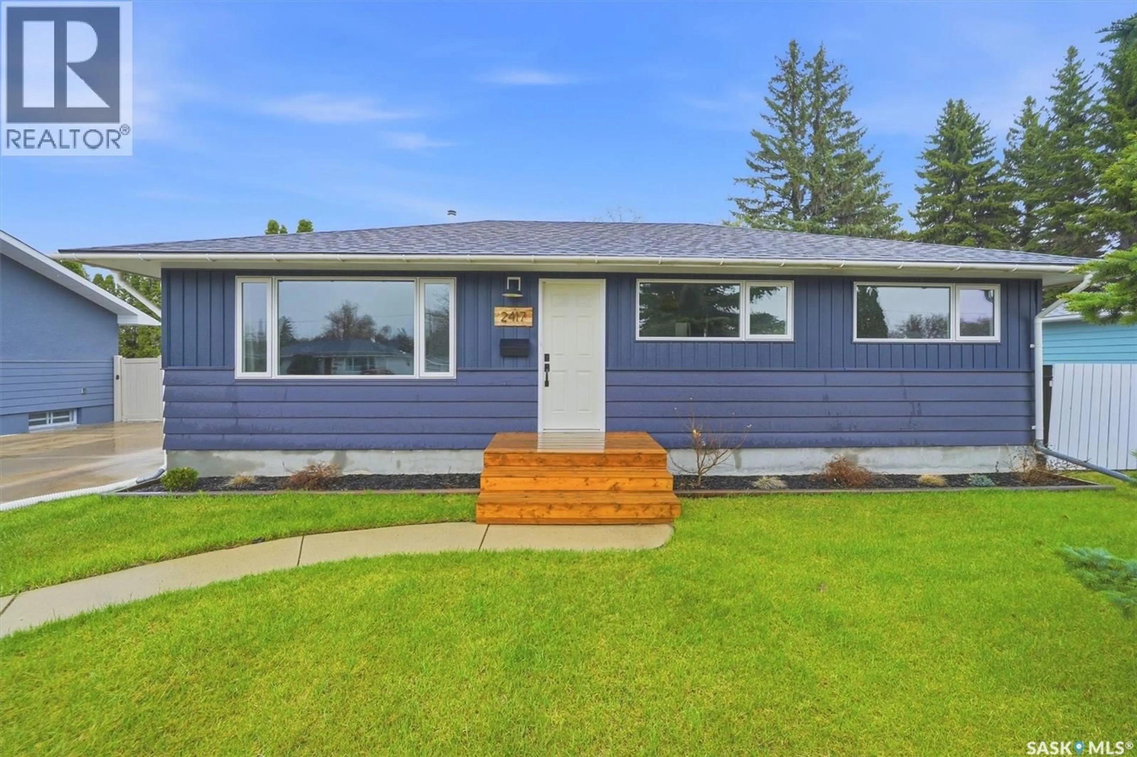 Home with vinyl exterior material, street for 2417 HANOVER AVENUE, Saskatoon Saskatchewan S7J1E7