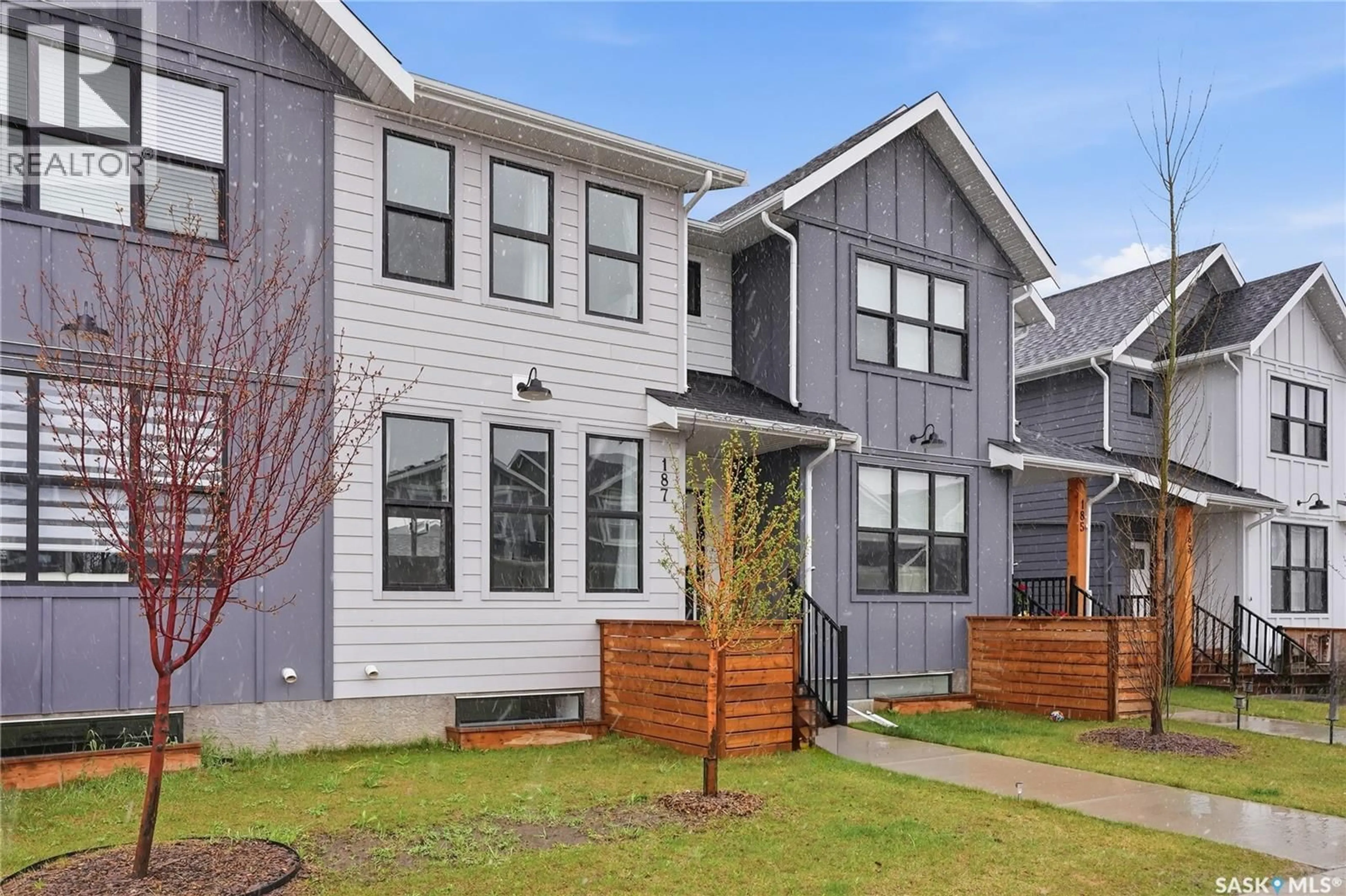 Home with vinyl exterior material, street for 187 ROSEWOOD BOULEVARD, Saskatoon Saskatchewan S7V0X2