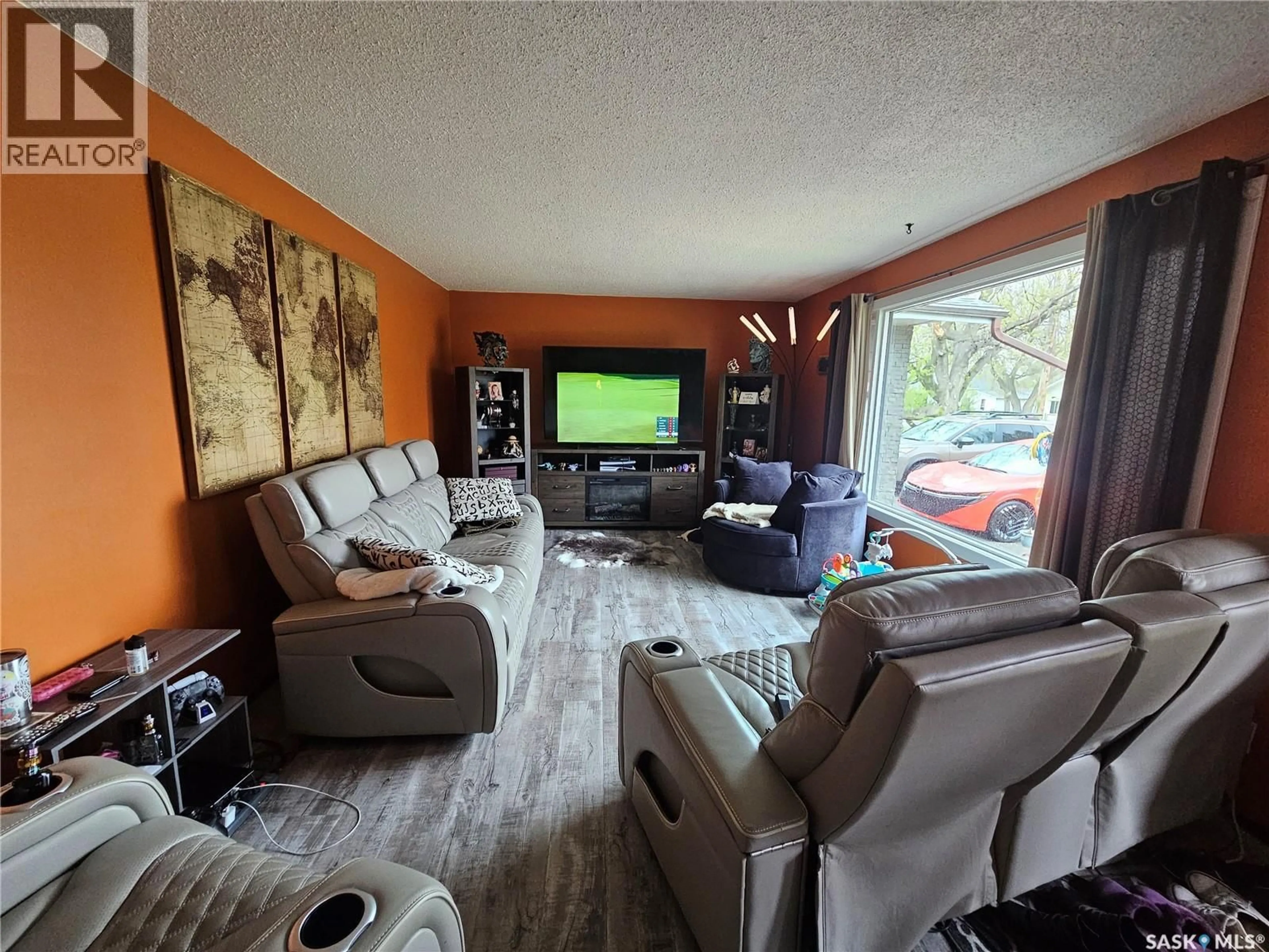 Living room with furniture, unknown for 1204 NORTH RAILWAY STREET, Swift Current Saskatchewan S9H1E7