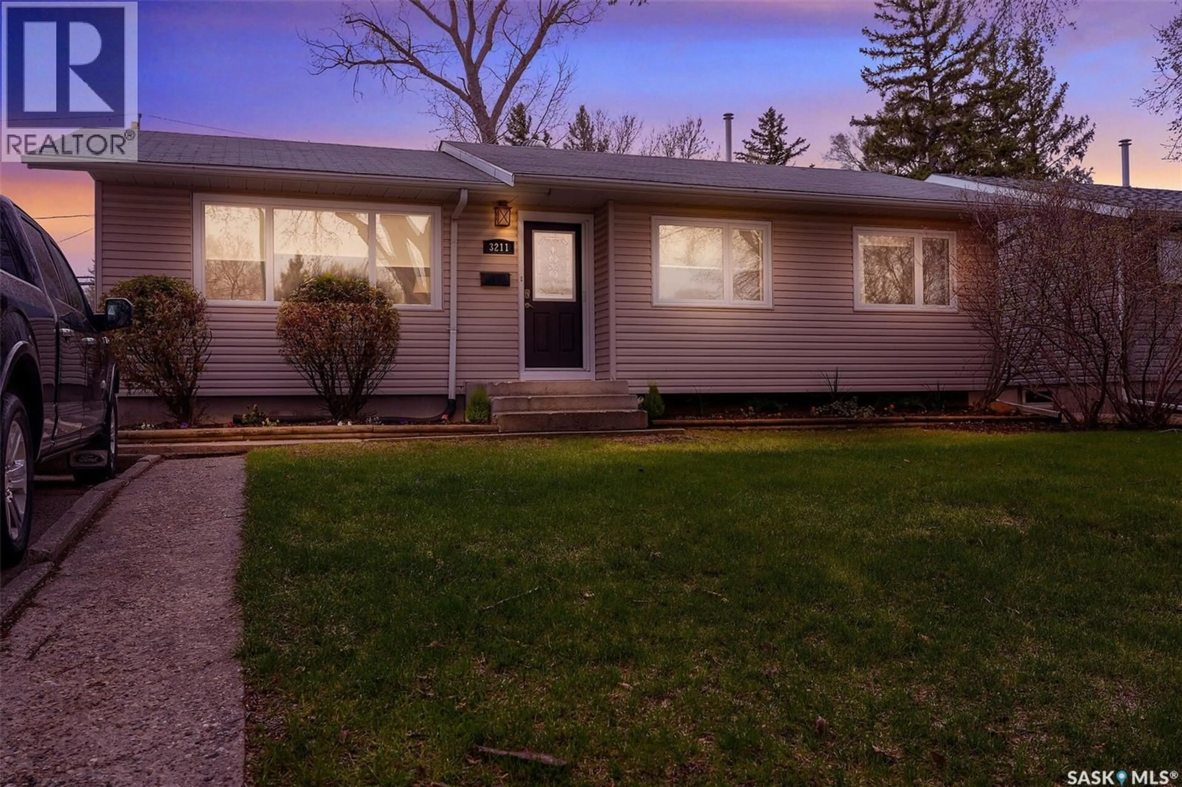 Home with vinyl exterior material, street for 3211 29TH AVENUE, Regina Saskatchewan S4S2P1