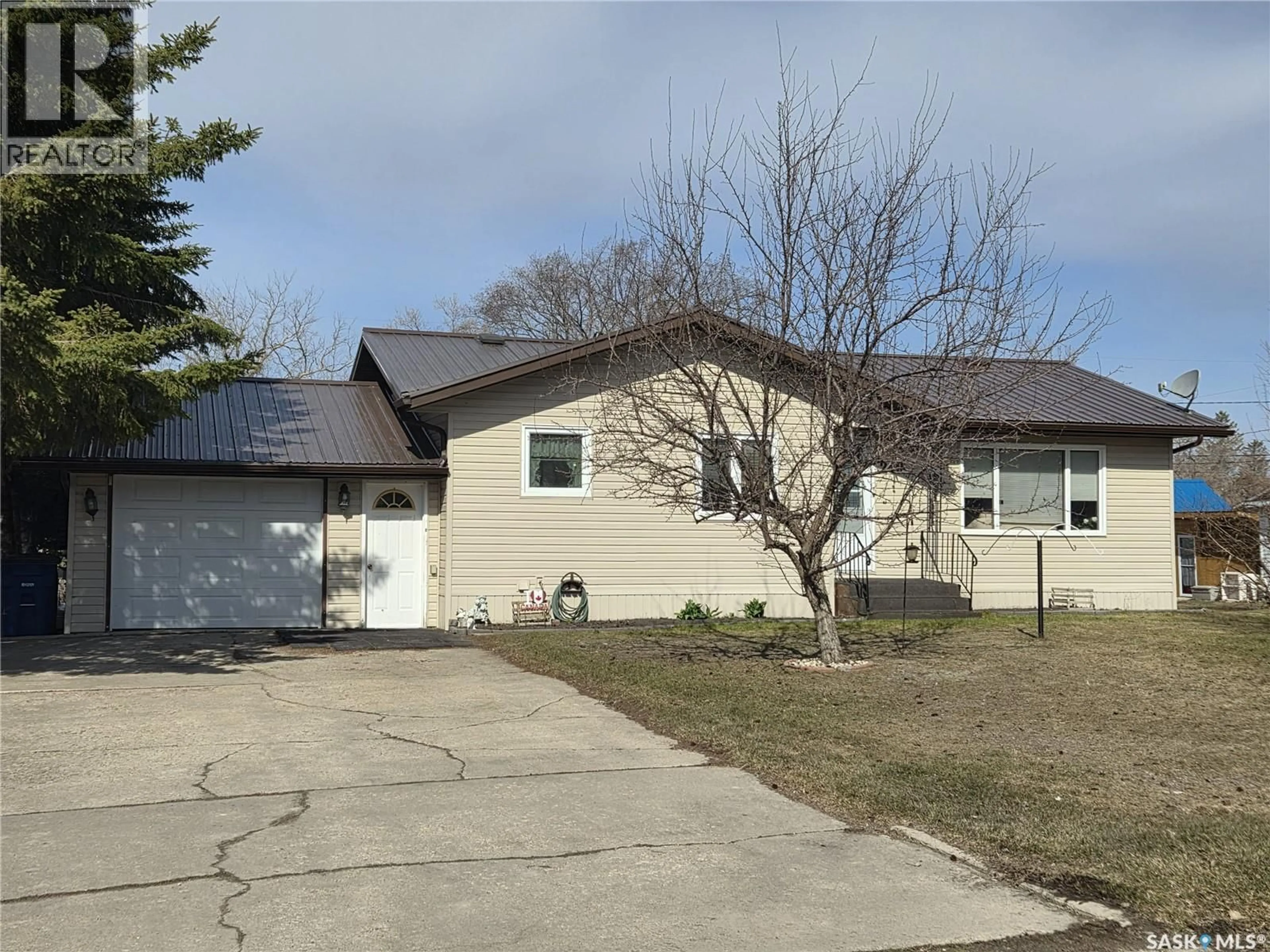 Home with vinyl exterior material, street for 249 SIXTH STREET, Wadena Saskatchewan S0A4J0