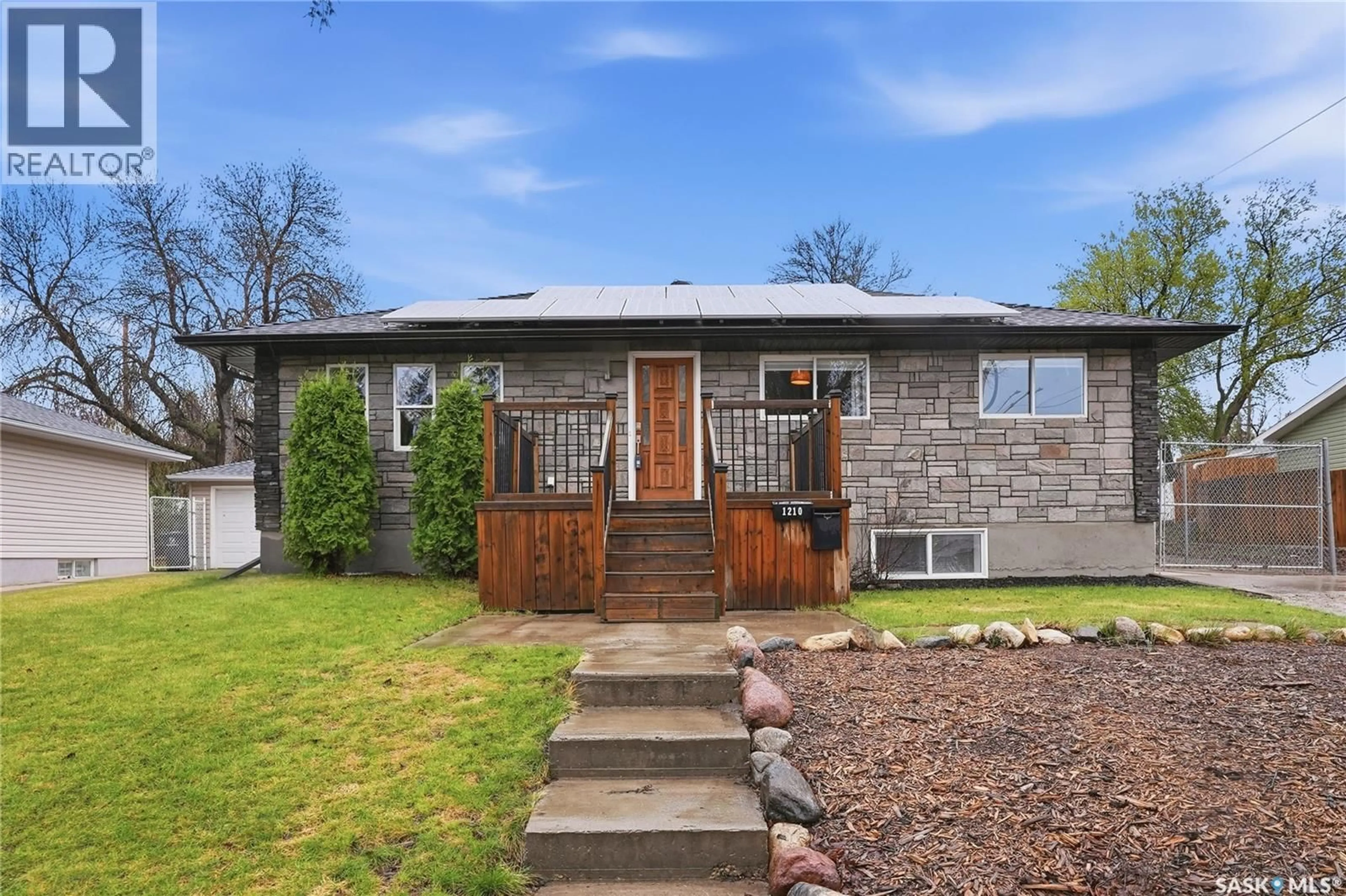 Home with brick exterior material, street for 1210 K AVENUE, Saskatoon Saskatchewan S7L2N9
