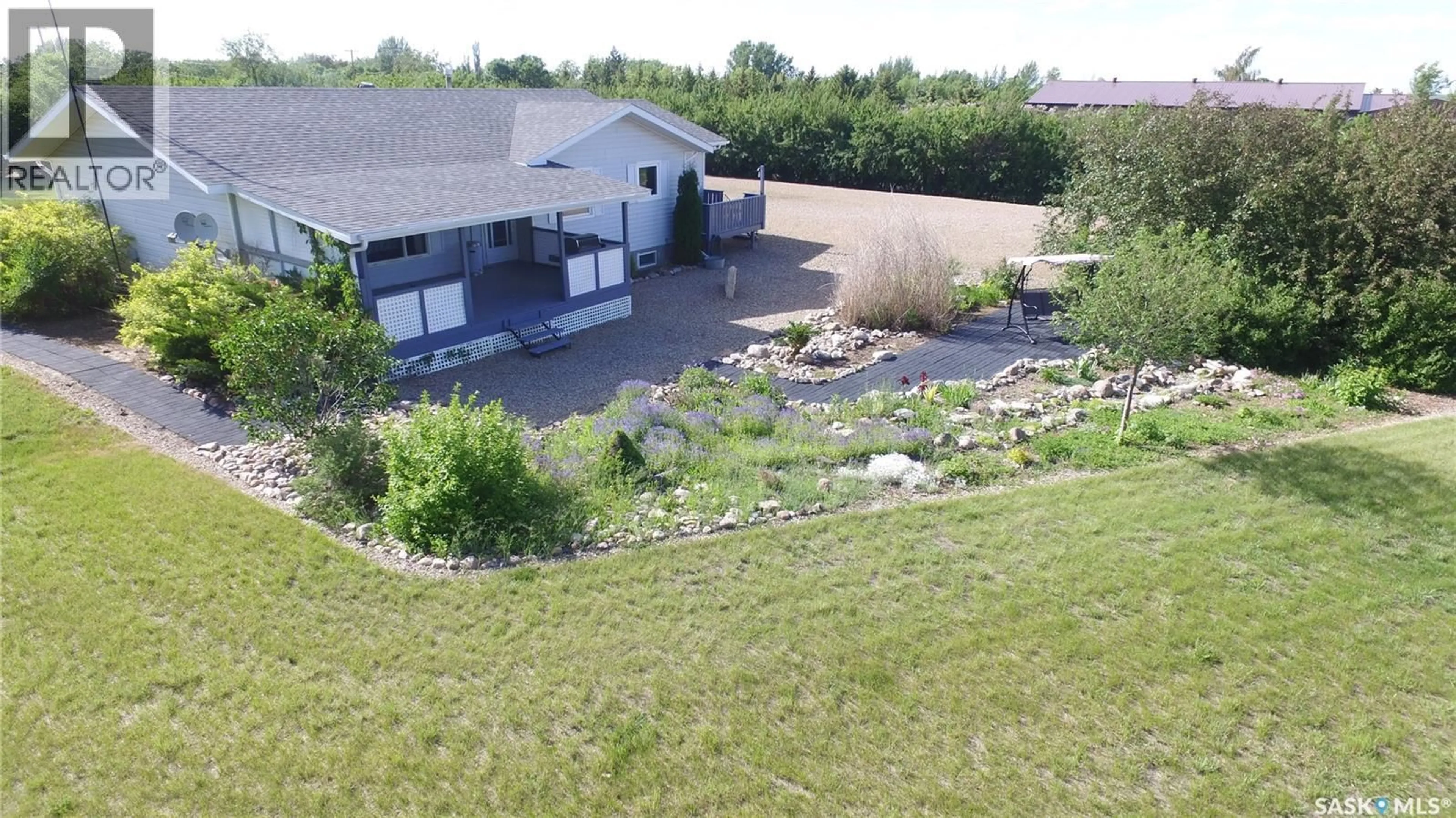 A pic from outside/outdoor area/front of a property/back of a property/a pic from drone, water/lake/river/ocean view for HUNT ACREAGE, Gull Lake Rm No. 139 Saskatchewan S0N1A0