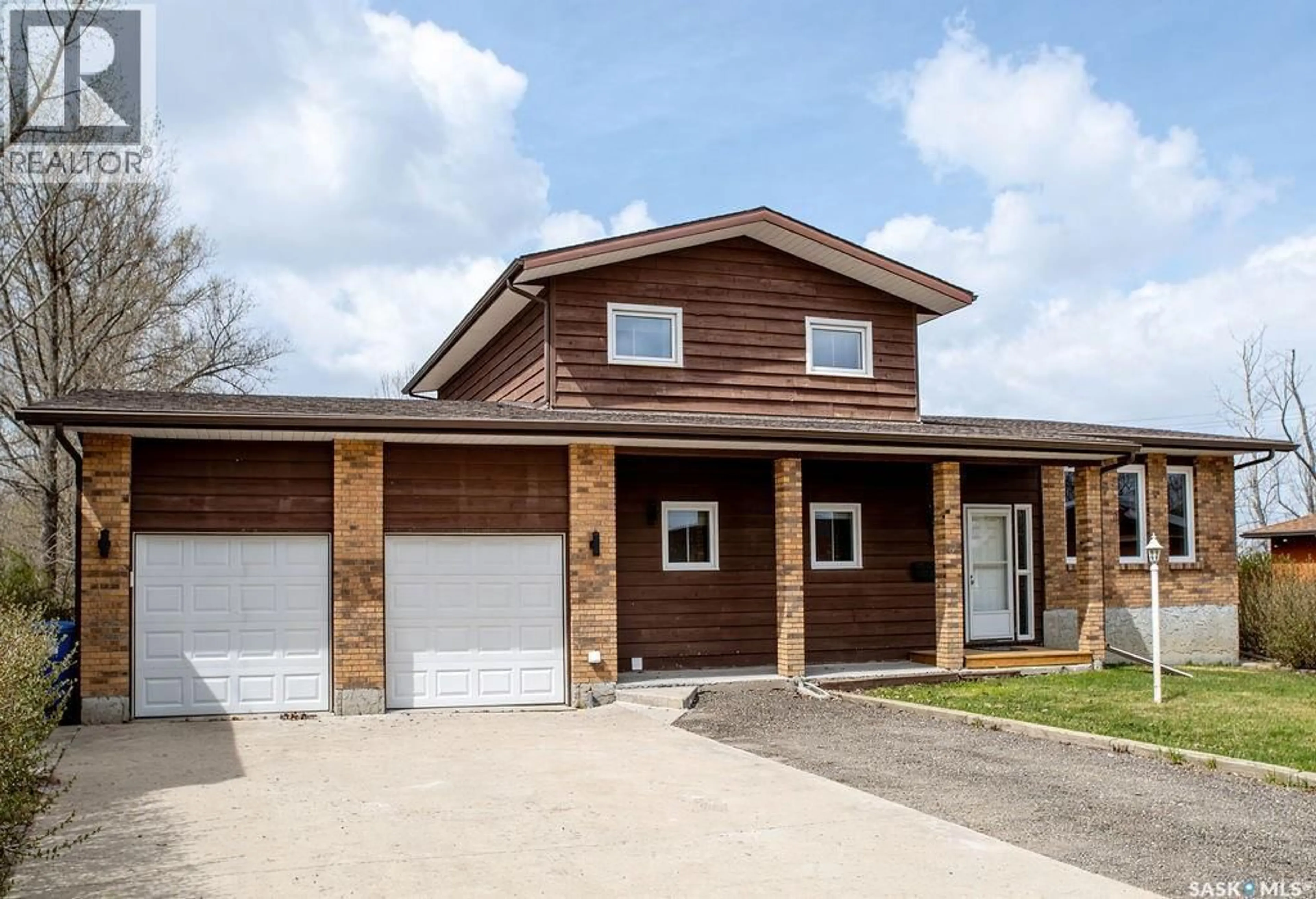 Home with vinyl exterior material, street for 1 HOIDALE AVENUE, Lajord Rm No. 128 Saskatchewan S0G2T0
