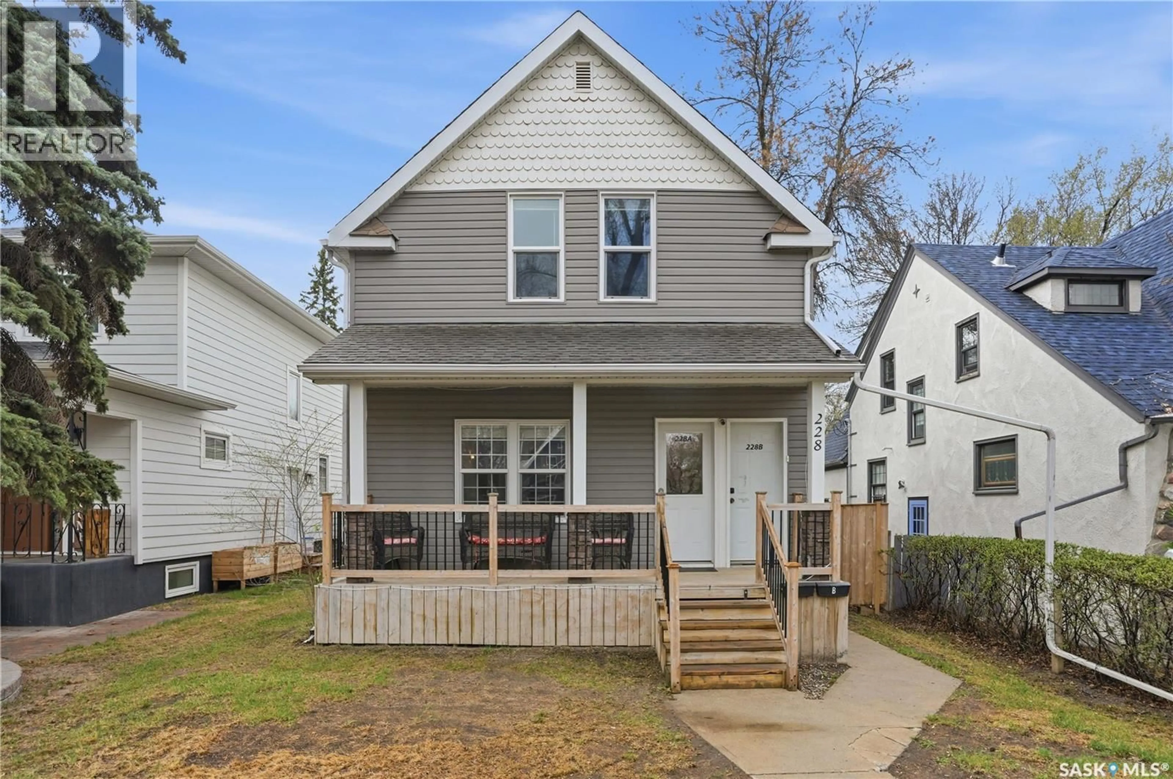 Home with vinyl exterior material, street for 228 8TH STREET, Saskatoon Saskatchewan S7H0P3