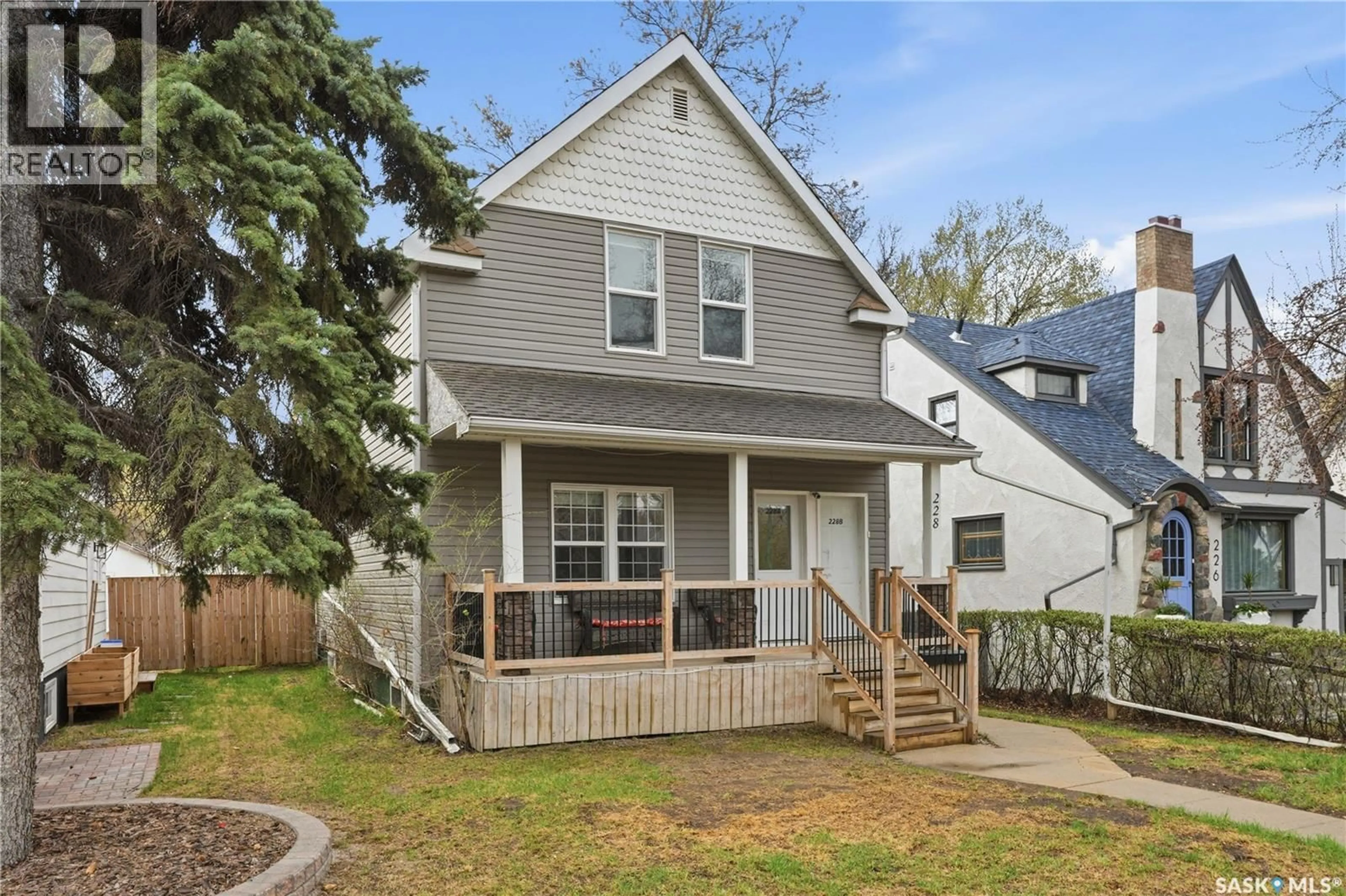 Home with vinyl exterior material, street for 228 8TH STREET, Saskatoon Saskatchewan S7H0P3