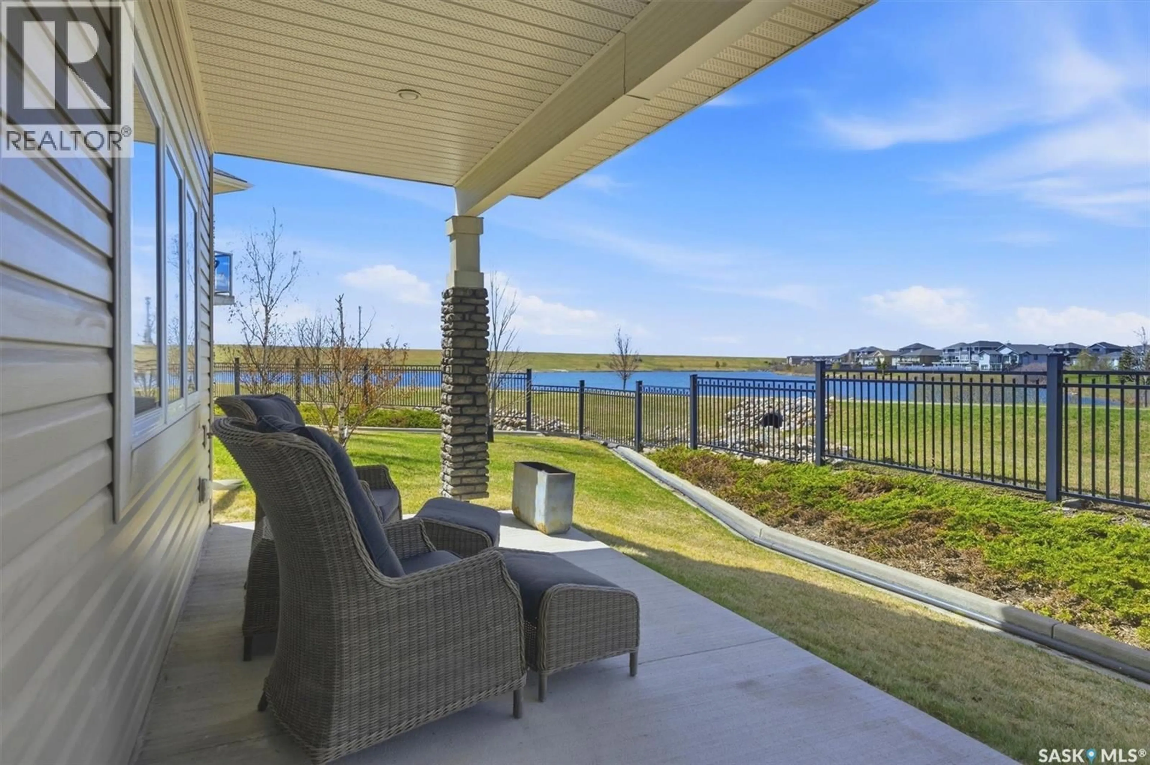 Patio, water/lake/river/ocean view for 109 542 PRINGLE CRESCENT, Saskatoon Saskatchewan S7T0W9