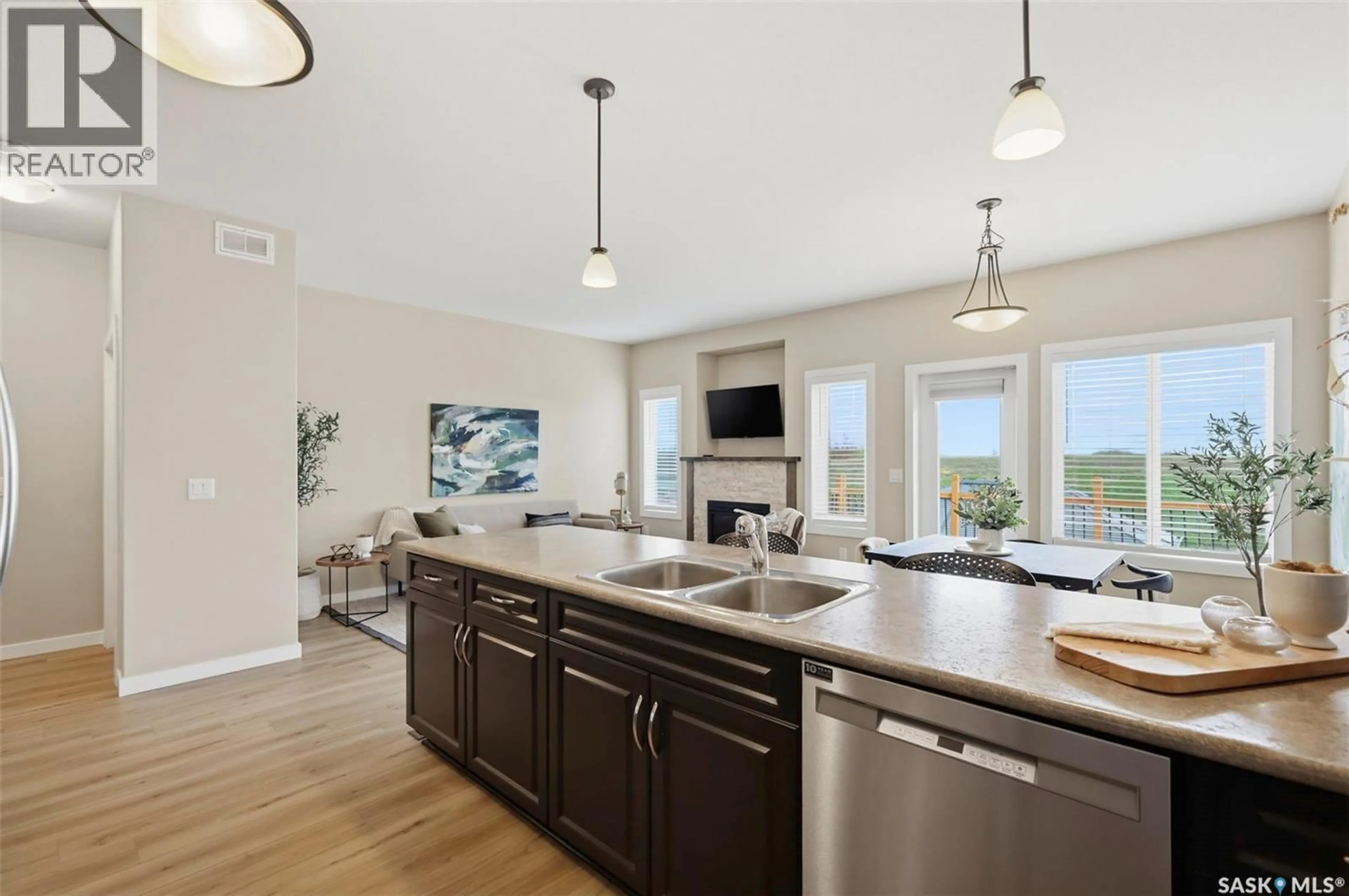Open concept kitchen, ceramic/tile floor for 451 HENICK CRESCENT, Saskatoon Saskatchewan S7R0J4