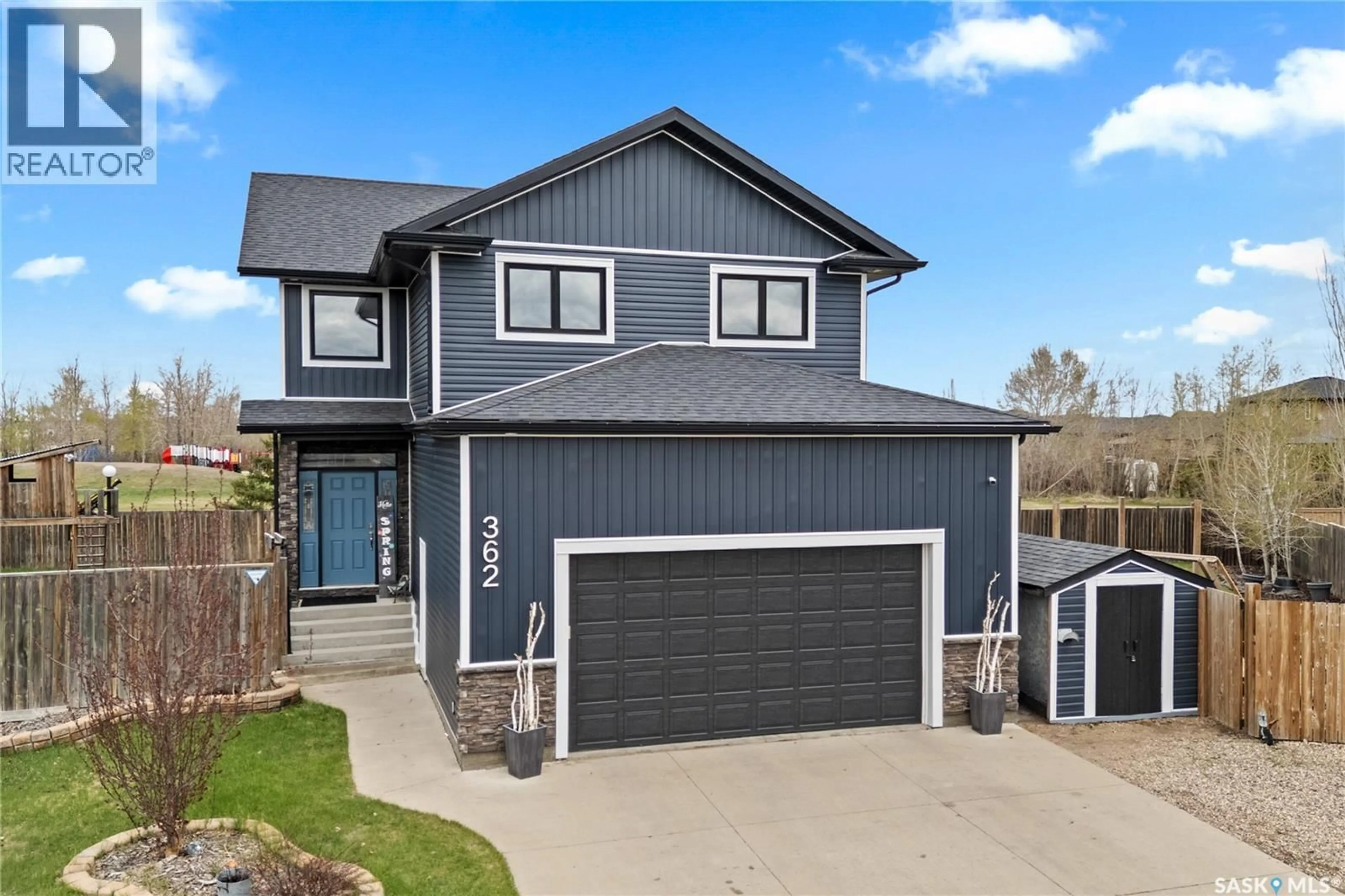 Home with vinyl exterior material, street for 362 CHARITY COVE, Martensville Saskatchewan S0K0A2