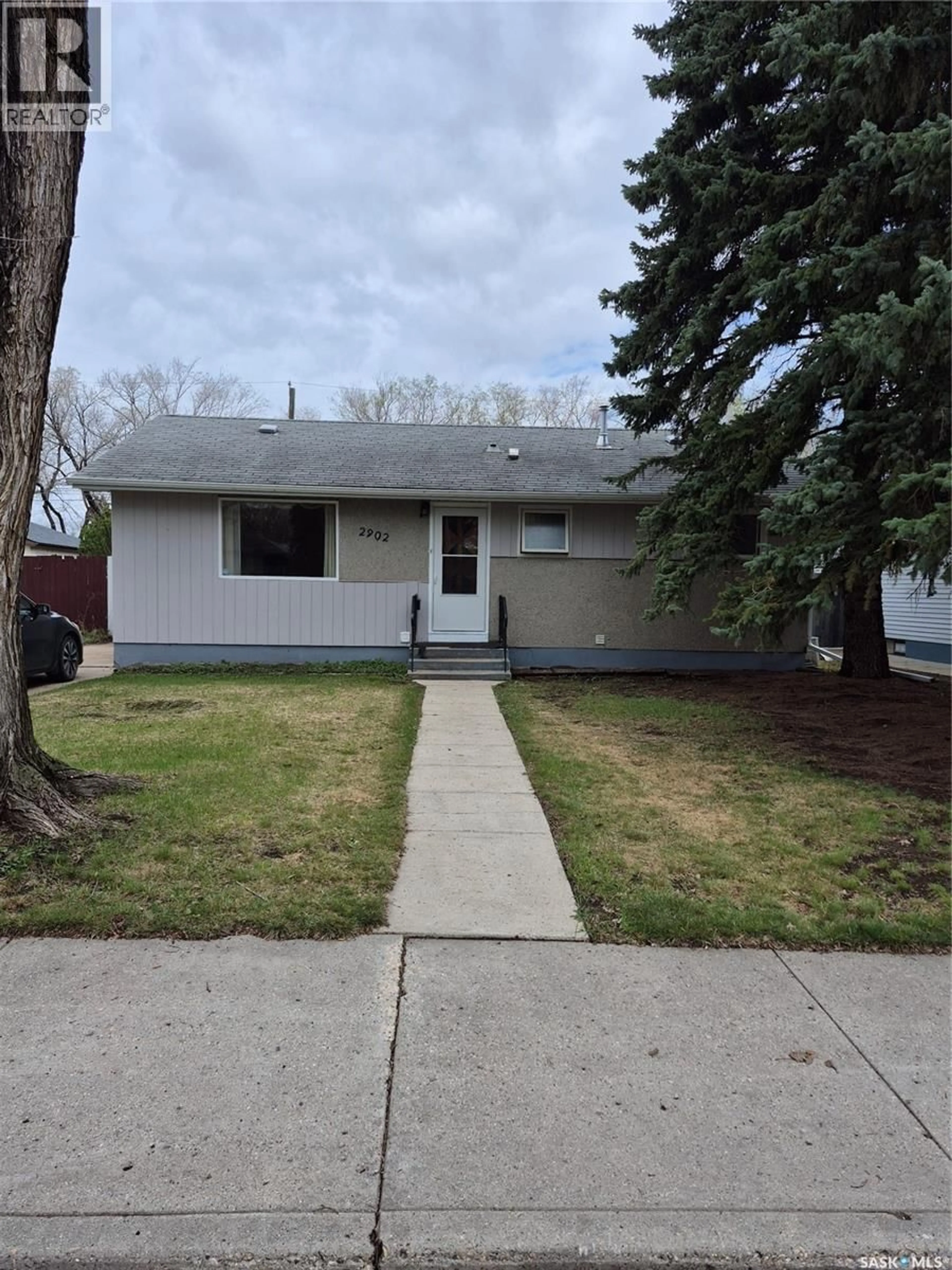 Home with vinyl exterior material, street for 2902 21ST STREET, Saskatoon Saskatchewan S7M0W5