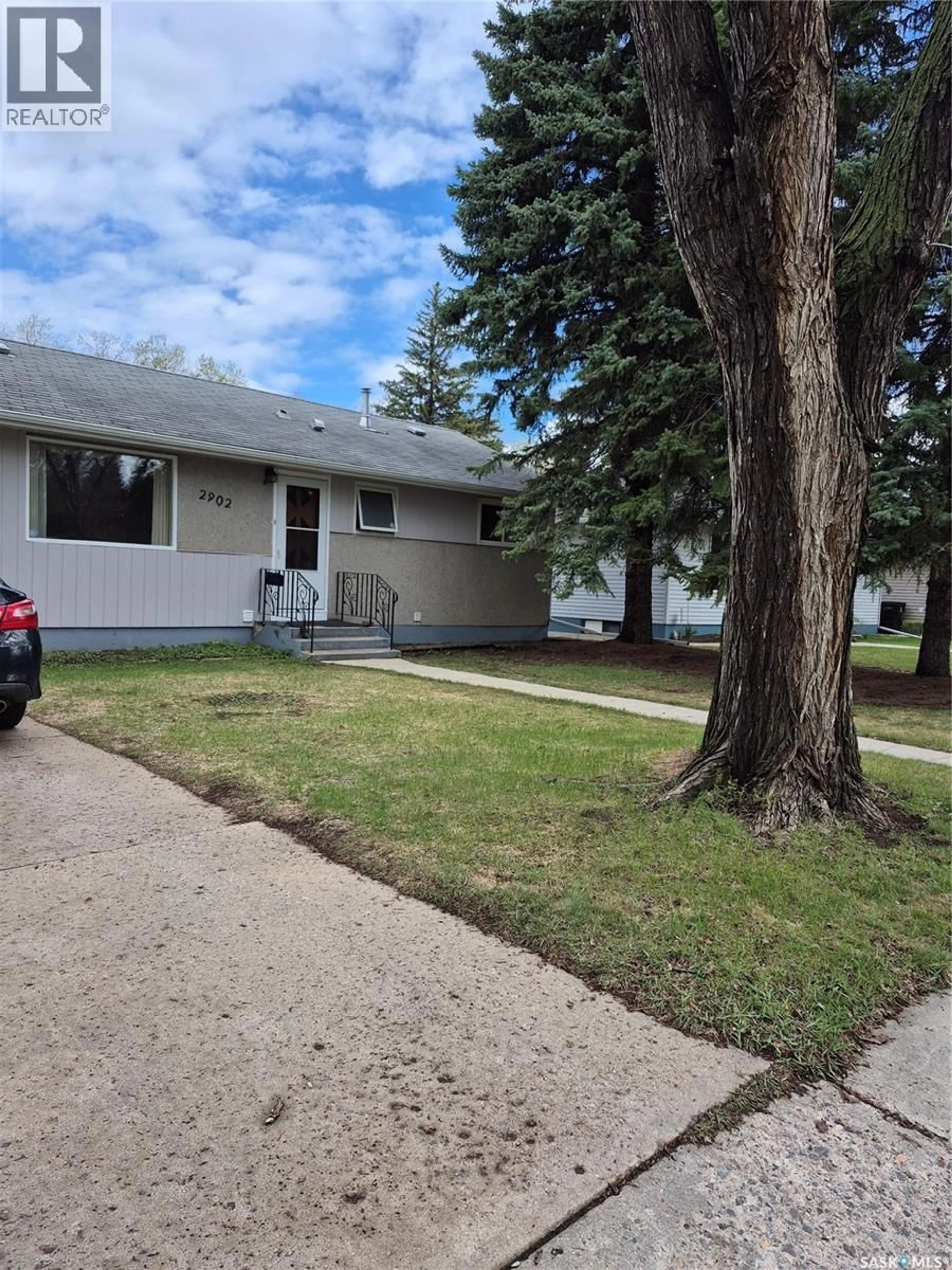 Home with vinyl exterior material, street for 2902 21ST STREET, Saskatoon Saskatchewan S7M0W5