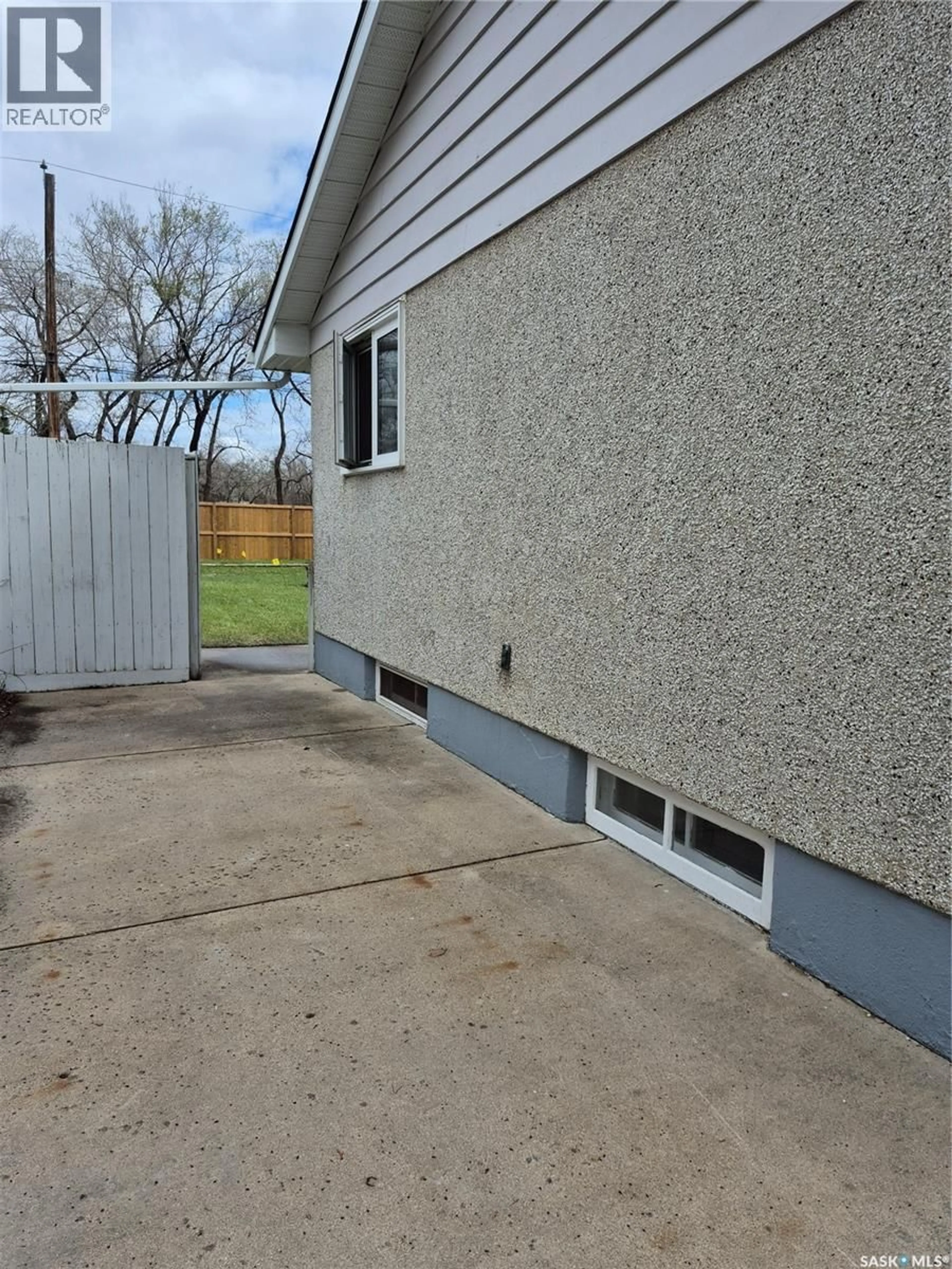 Home with vinyl exterior material, street for 2902 21ST STREET, Saskatoon Saskatchewan S7M0W5