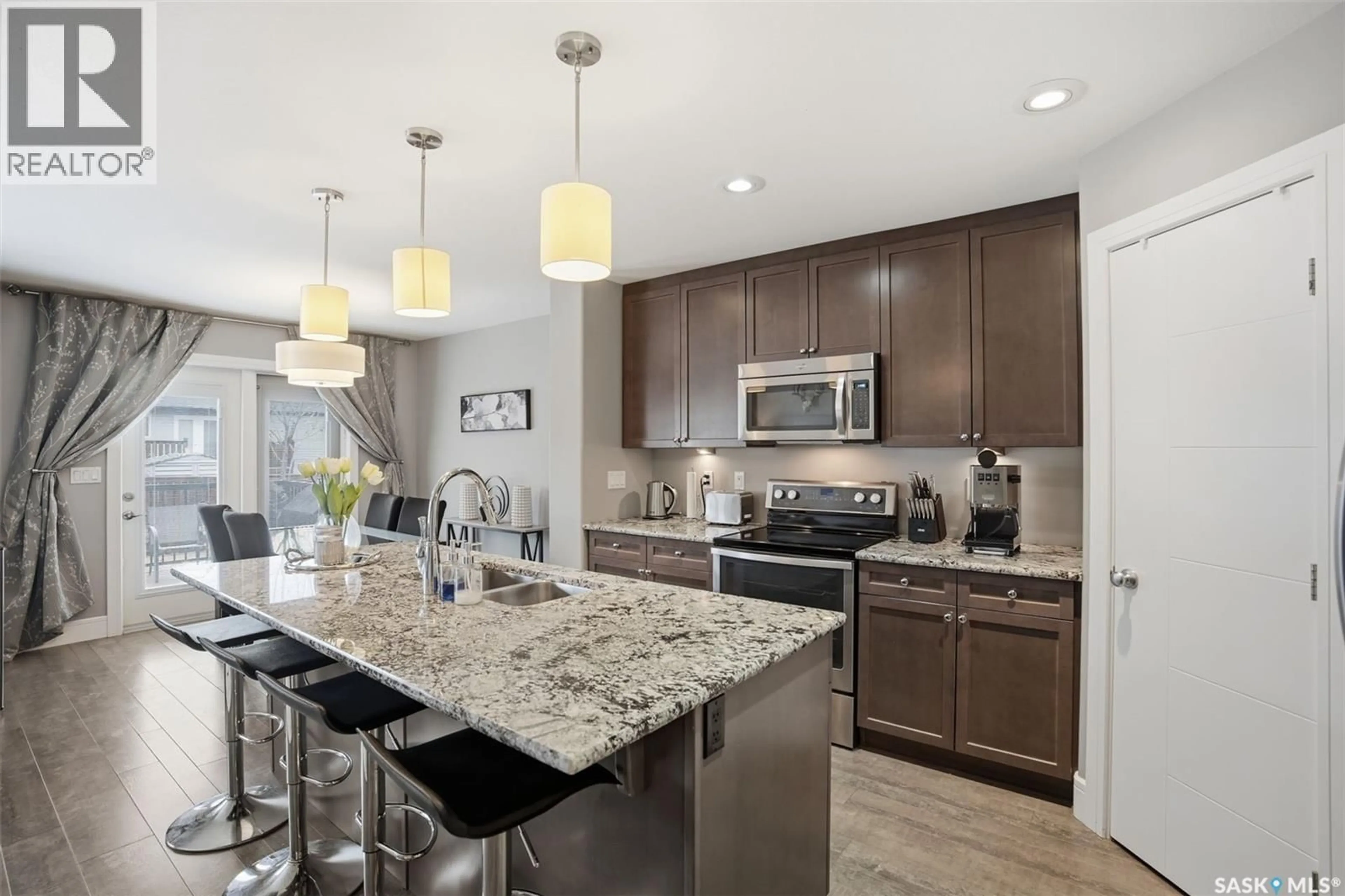 Open concept kitchen, ceramic/tile floor for 346 DICKSON CRESCENT, Saskatoon Saskatchewan S7T0T8