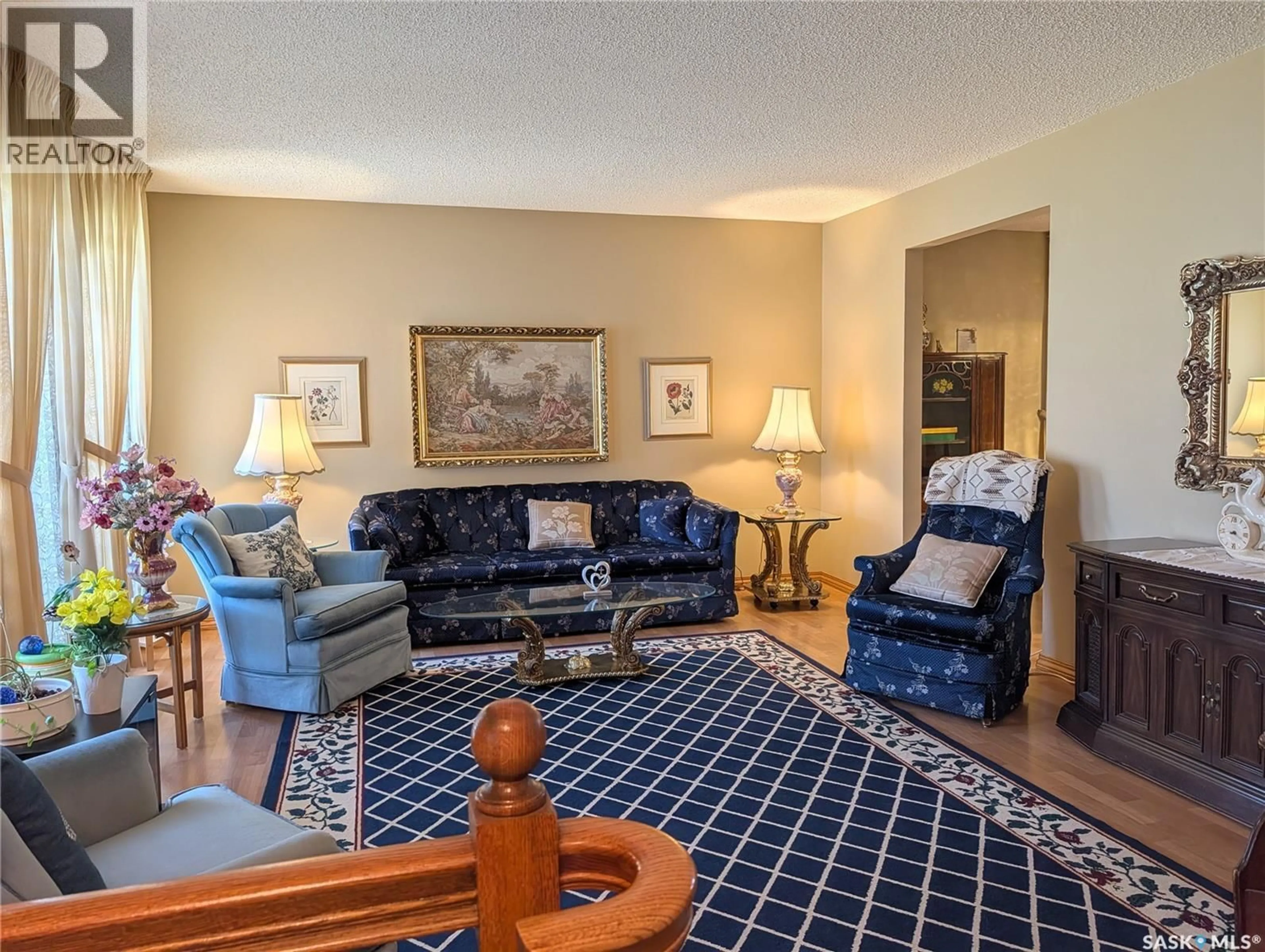 Living room with furniture, carpet floor for 215 DALGLIESH DRIVE, Regina Saskatchewan S4R7Z6