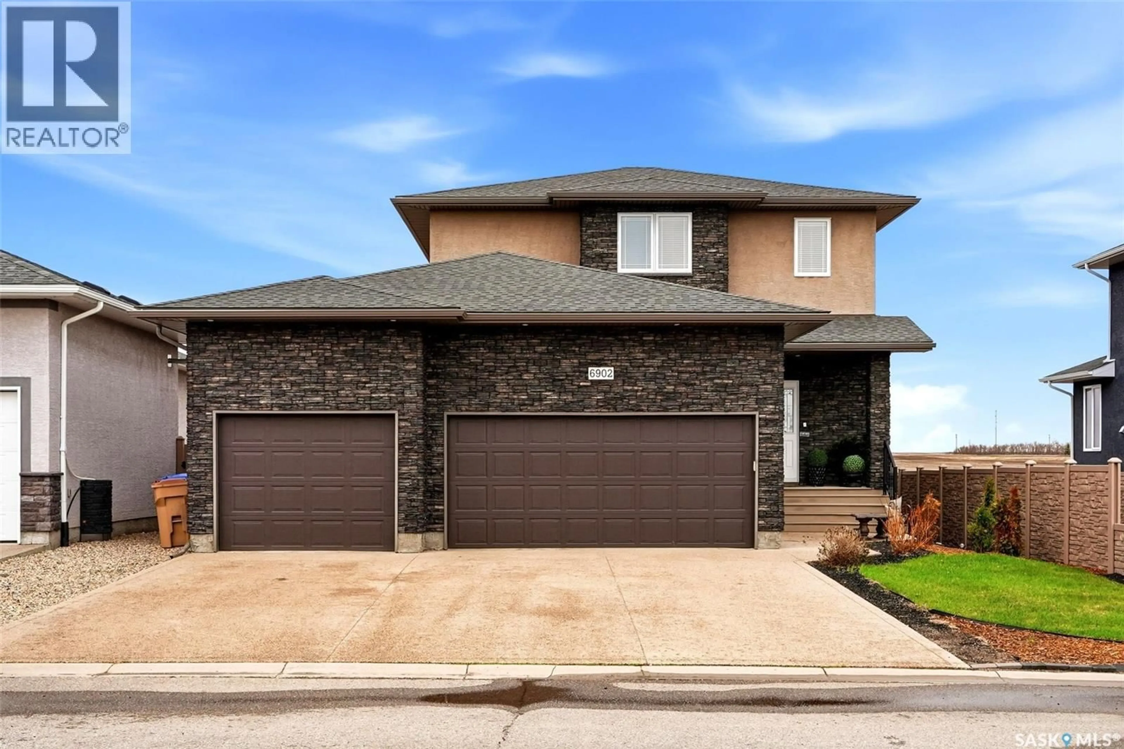 Home with brick exterior material, street for 6902 MAPLE VISTA DRIVE, Regina Saskatchewan S4X0J8