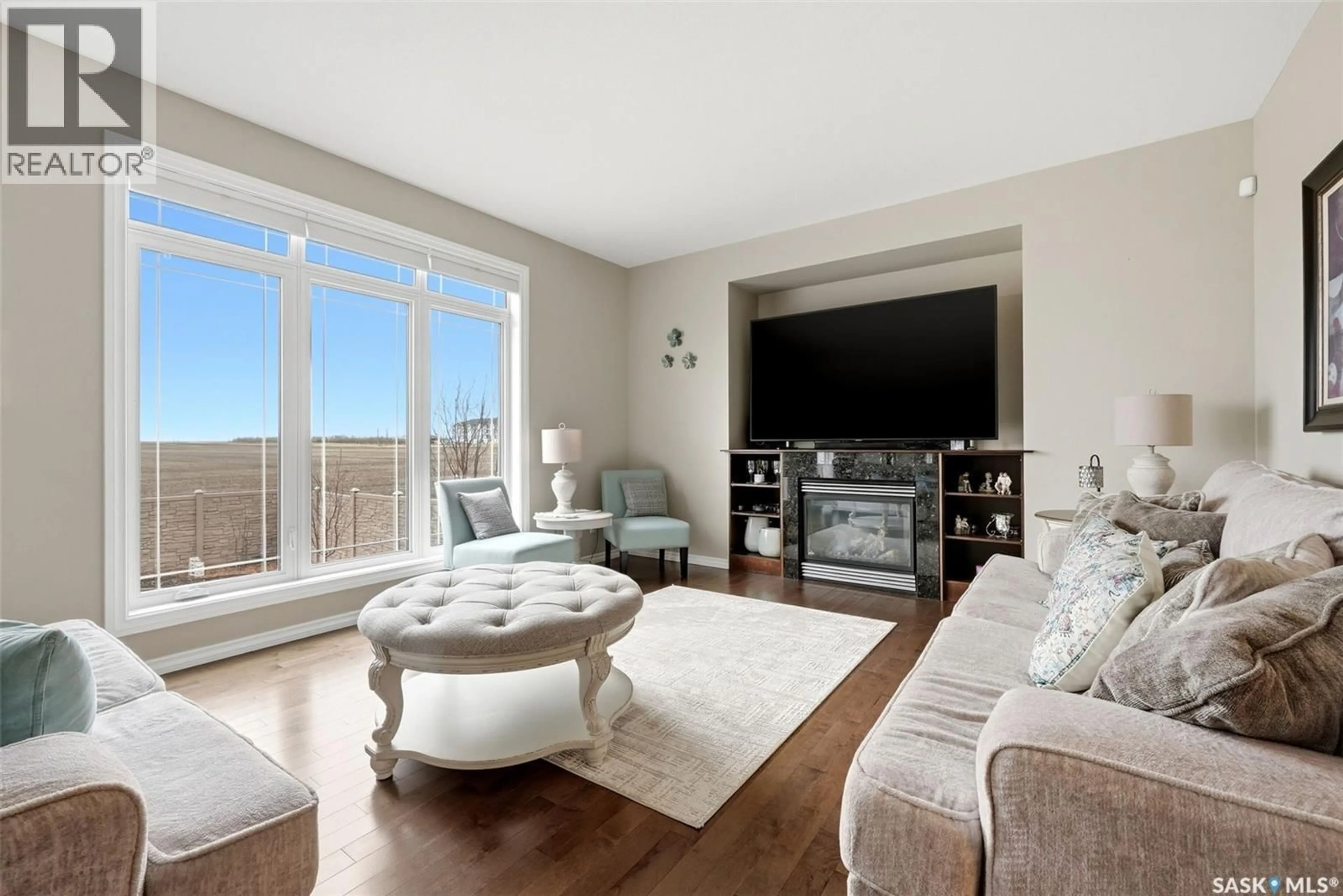 Living room with furniture, unknown for 6902 MAPLE VISTA DRIVE, Regina Saskatchewan S4X0J8